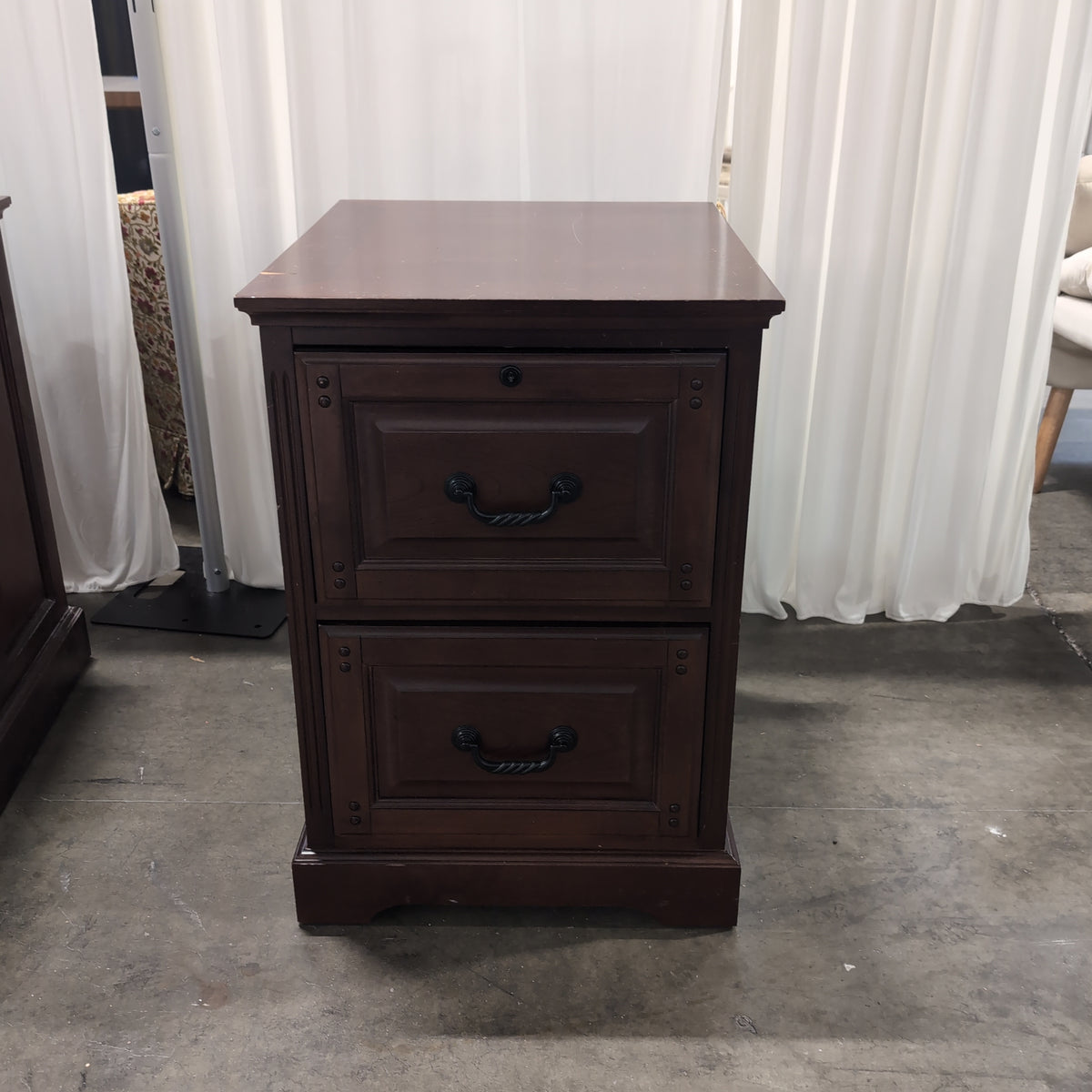 Dark Wood Two-Drawer Filing Cabinet with Ornate Pulls
