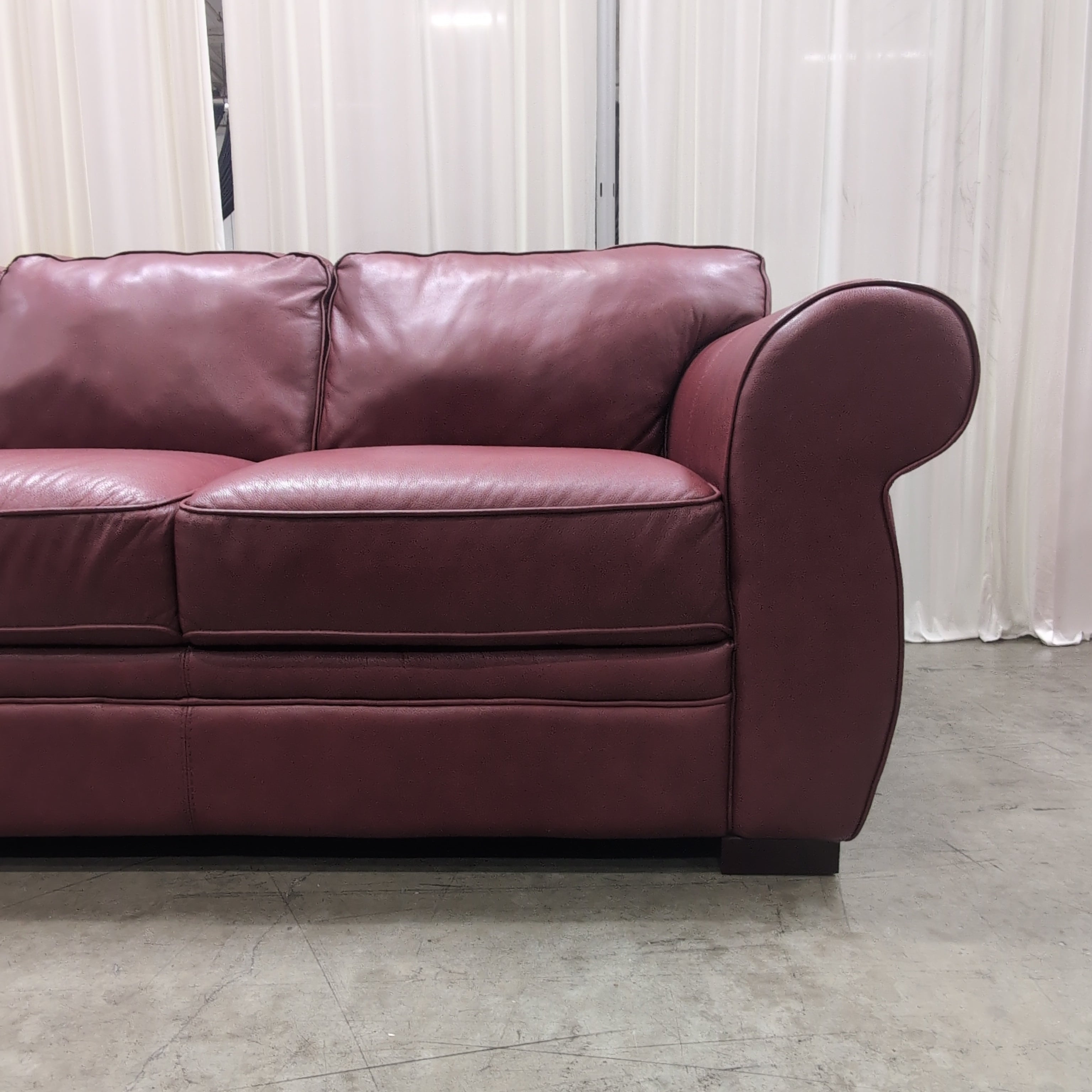 Burgundy Rolled Arm Three-Cushion Couch in Leather