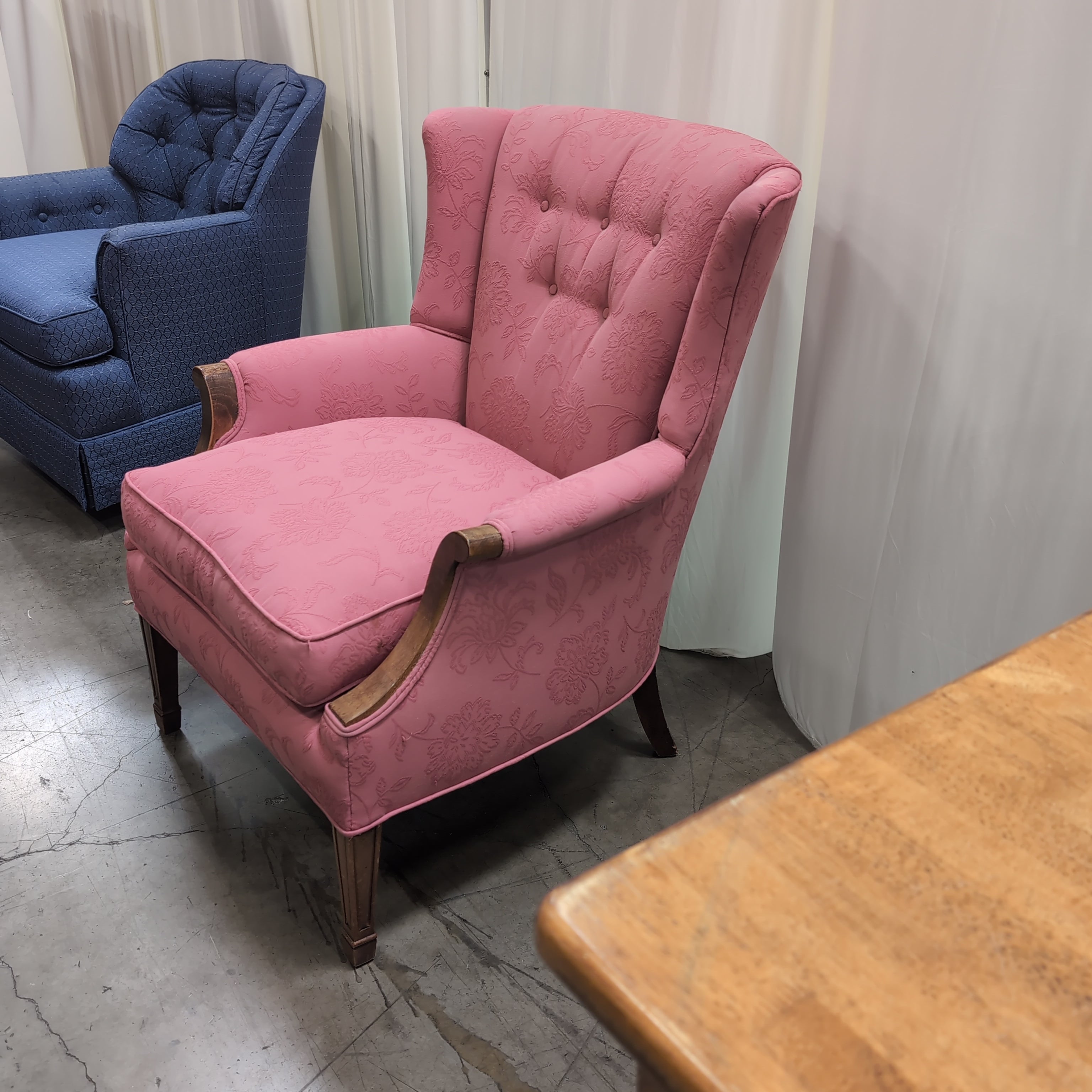 Pink Floral Upholstered Wingback Chair with Carved Wood Arms