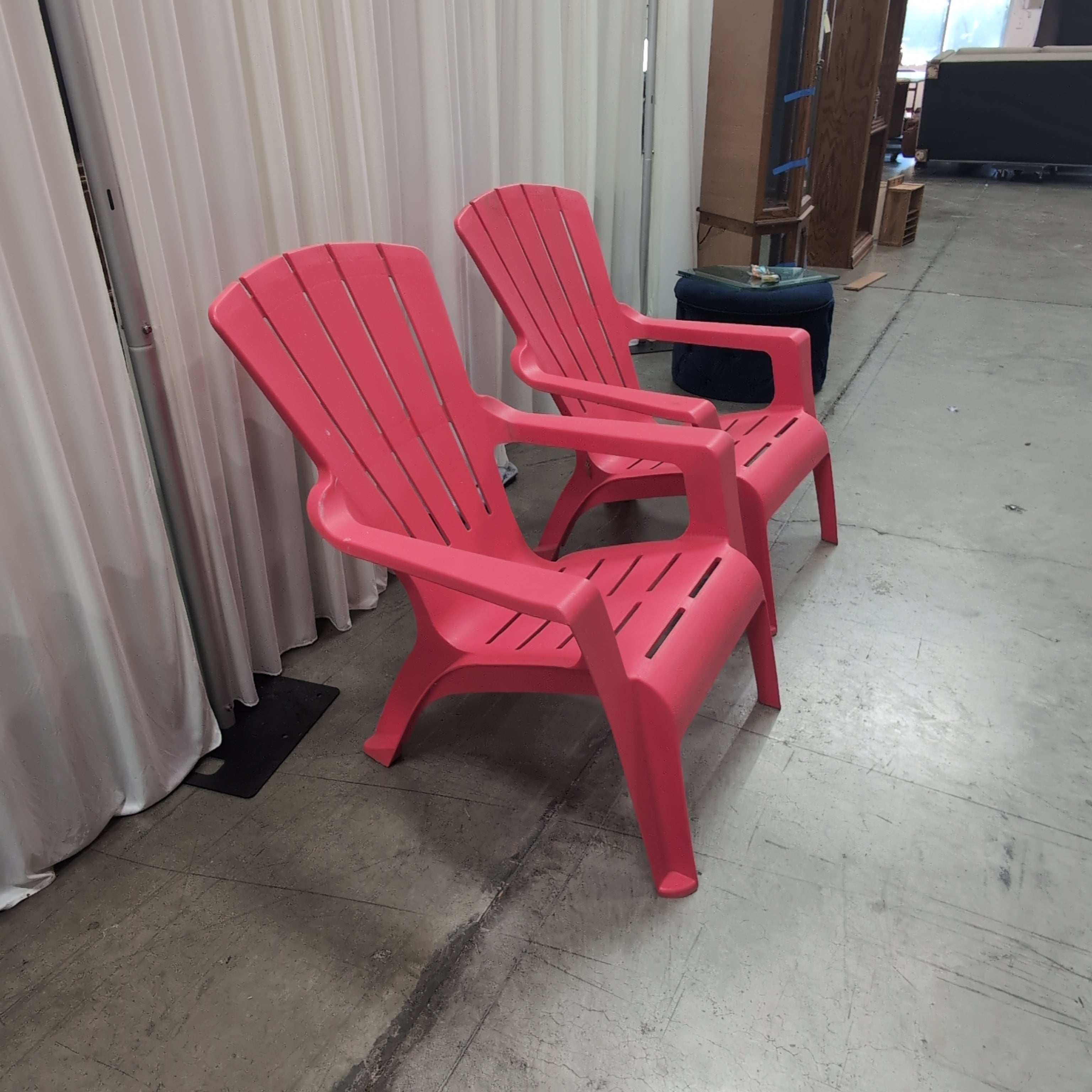 Pair of Red Plastic outdoor chairs