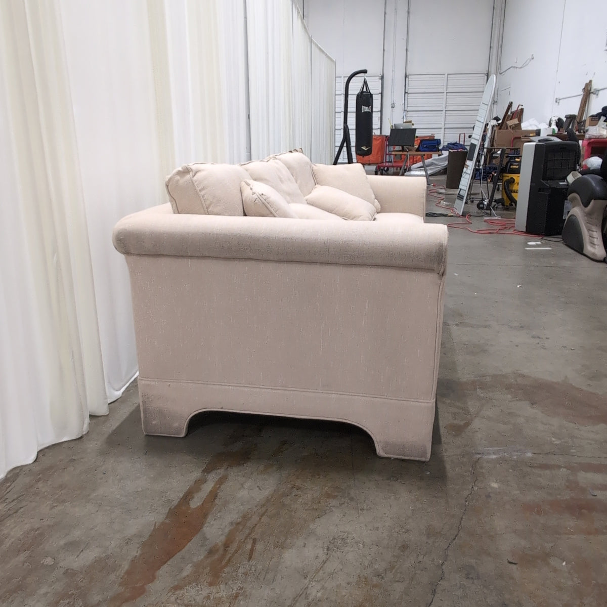 Beige Upholstered Rolled Arm Couch