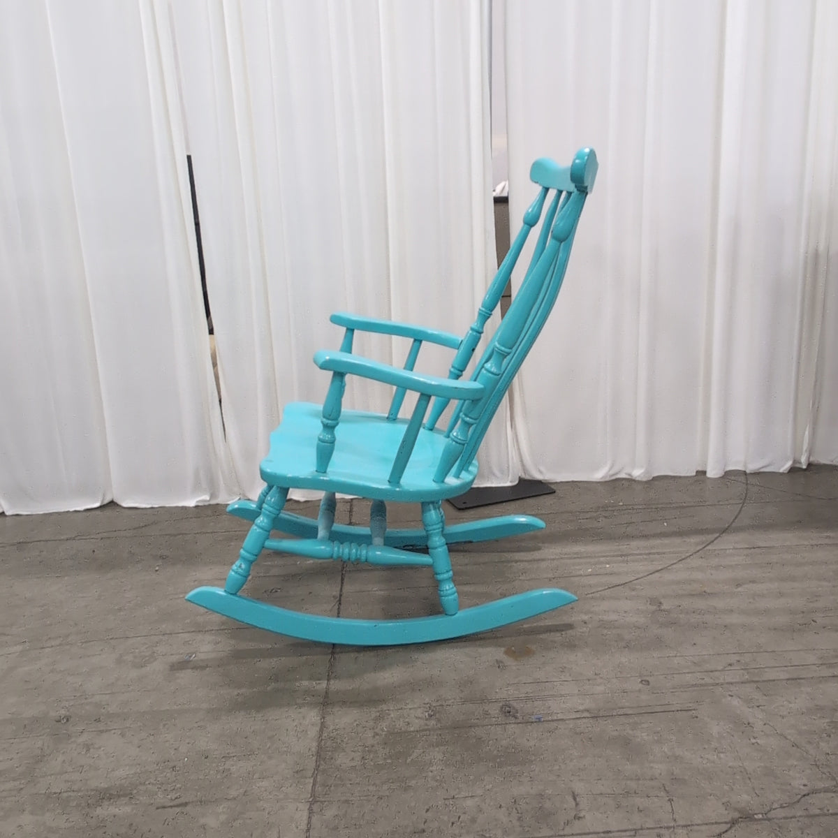 Bright Teal Spindle Back Rocking Chair in Wood