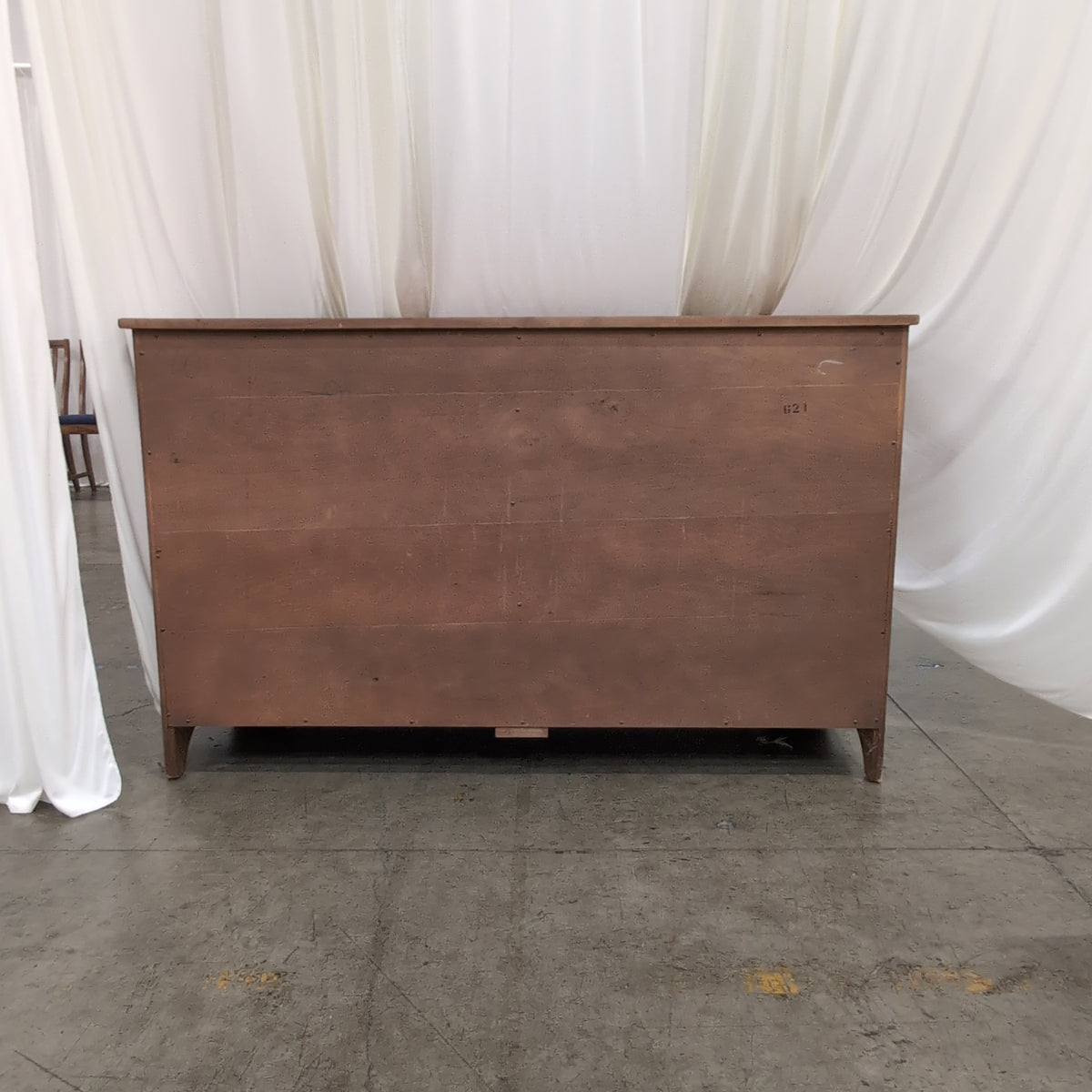 Brown Wood Nine-Drawer Dresser with Ornate Hardware