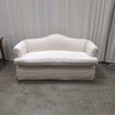 Cream Patterned Fabric Loveseat with Rolled Arms