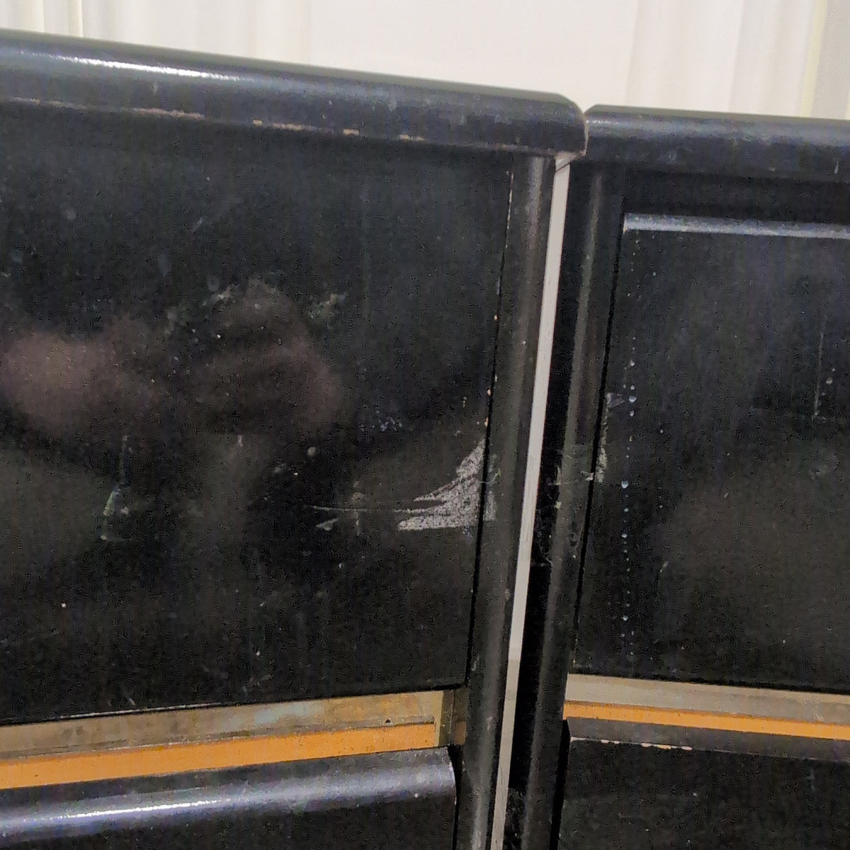 Black Lacquer Four-Drawer Dresser with Gold Pulls