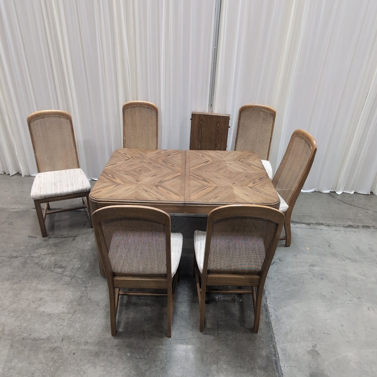 Wood Parquet Top Dining Table with Cane Back Chairs