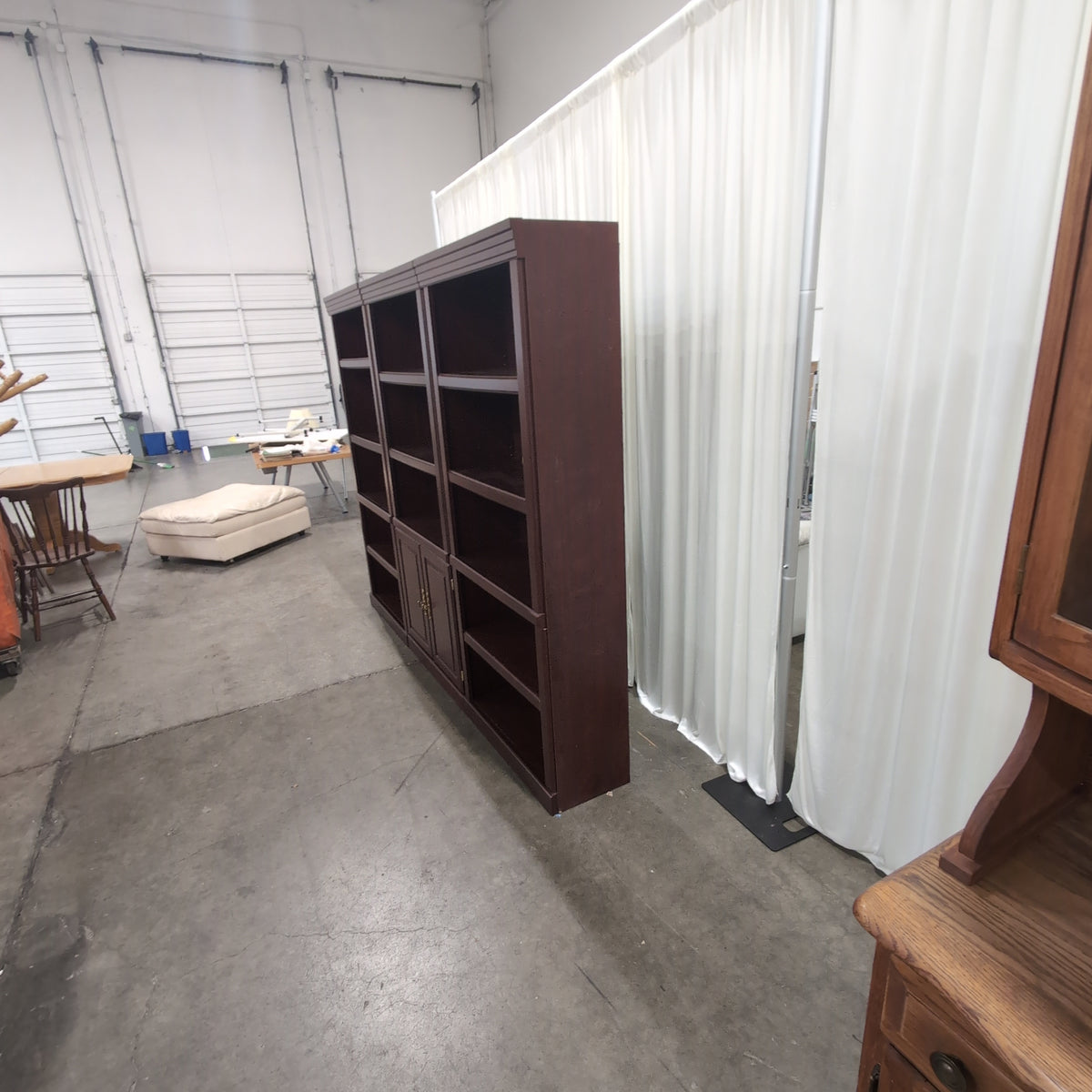 Sauder Dark Brown Three-Section Bookcase with Cabinet Doors