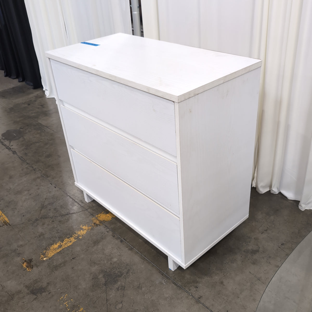White Three-Drawer Dresser in Wood Finish