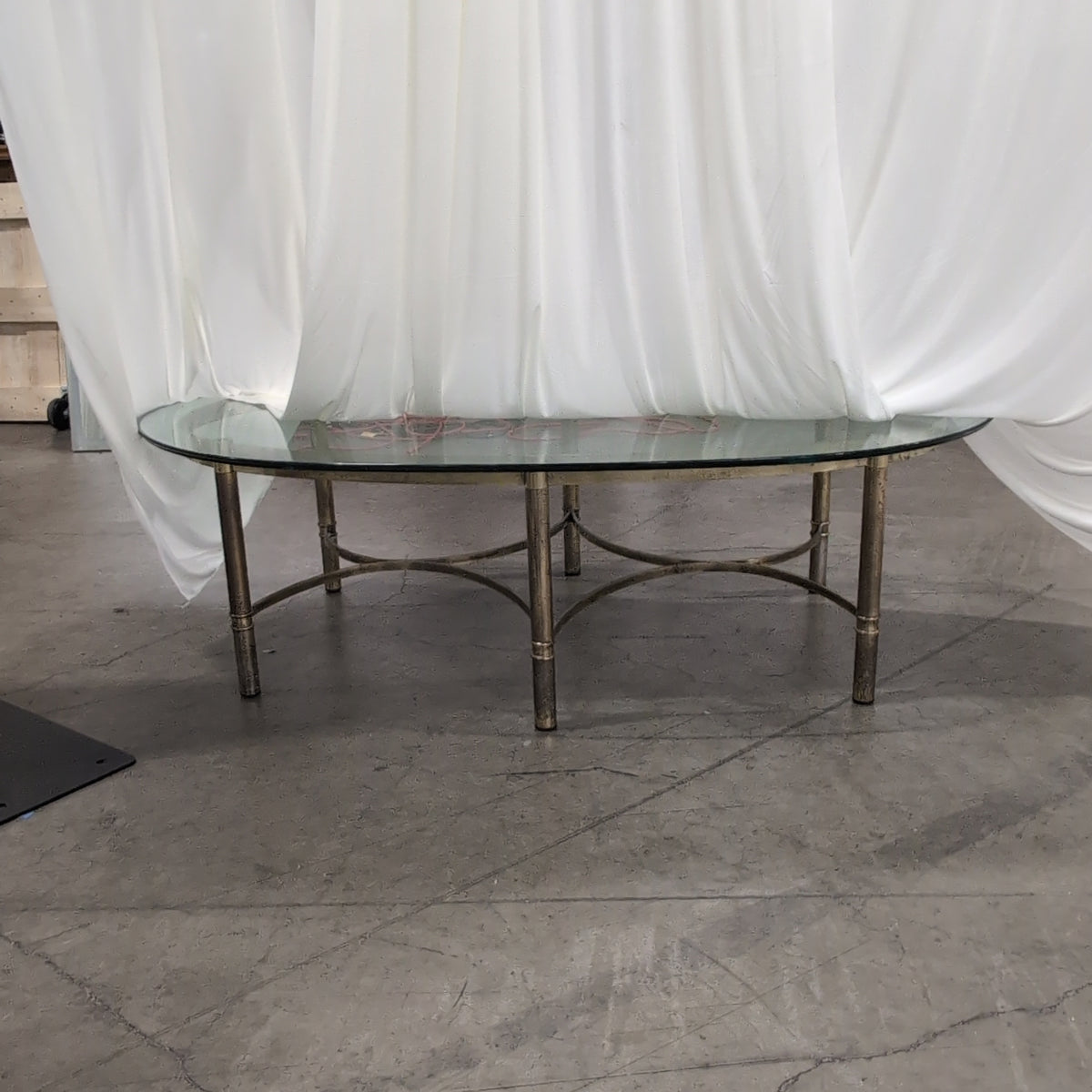 Oval Glass Top Coffee Table in Brass-Tone Metal