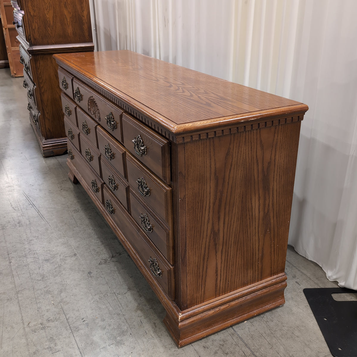 Traditional Brown Wood Dresser with Ornate Hardware