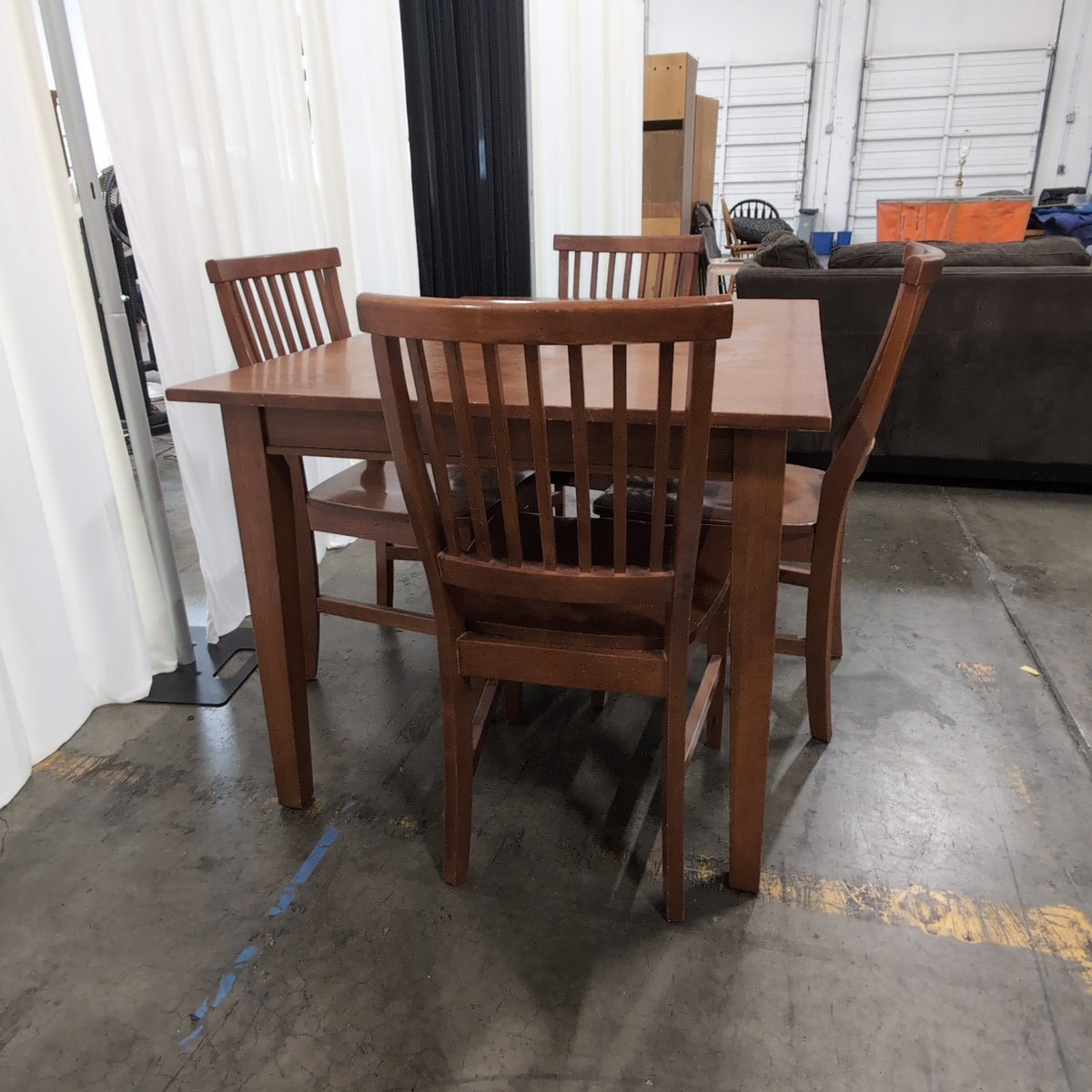 Brown Wood Dining Table and Four Chairs with Slatted Back Chairs