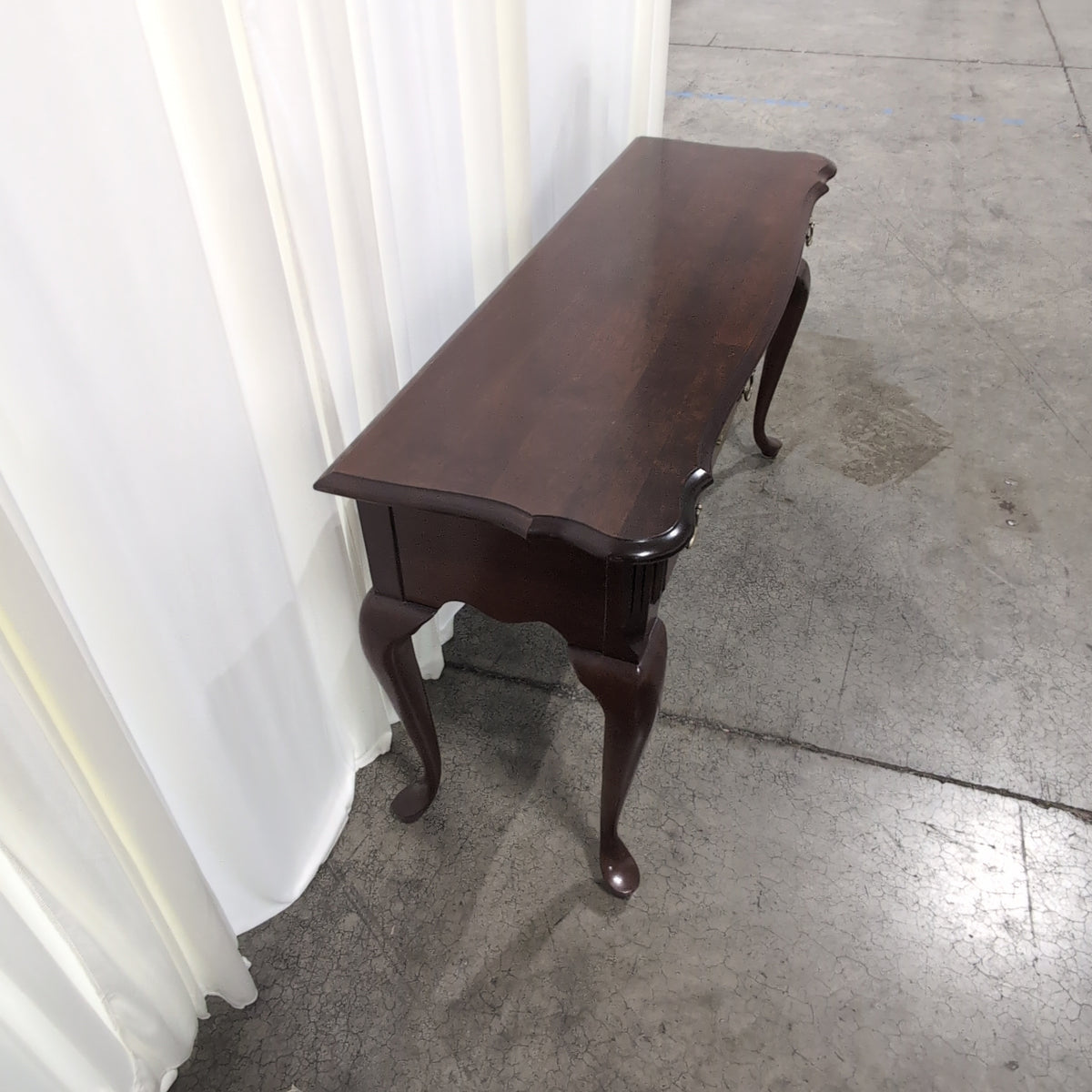 Traditional Dark Wood Console Table with Ornate Brass Hardware