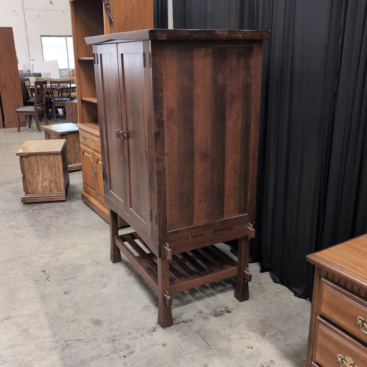 Rustic Dark Wood Two-Door Armoire with Slatted Base