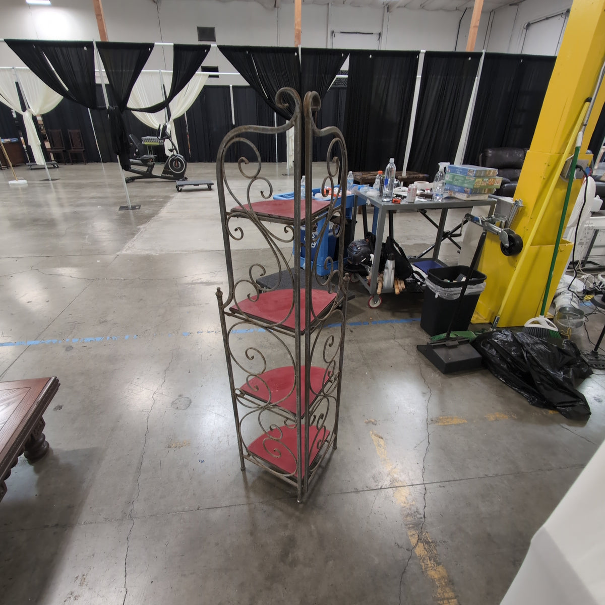 Ornate Scrolled Metal Corner Shelf with Red Shelves