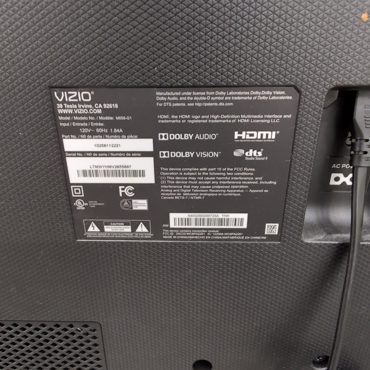 Large Black Flat Screen TV with Stand