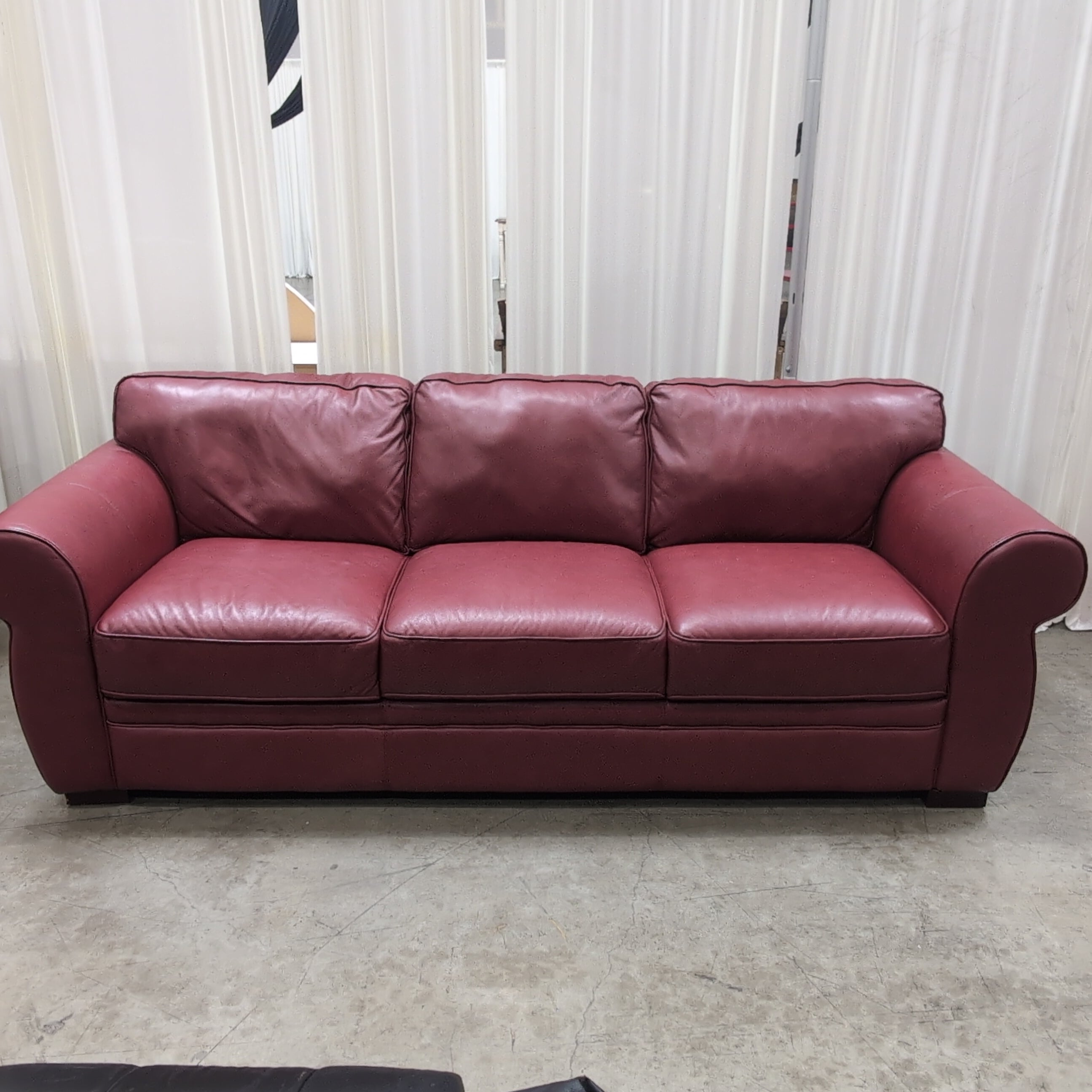 Burgundy Rolled Arm Three-Cushion Couch in Leather