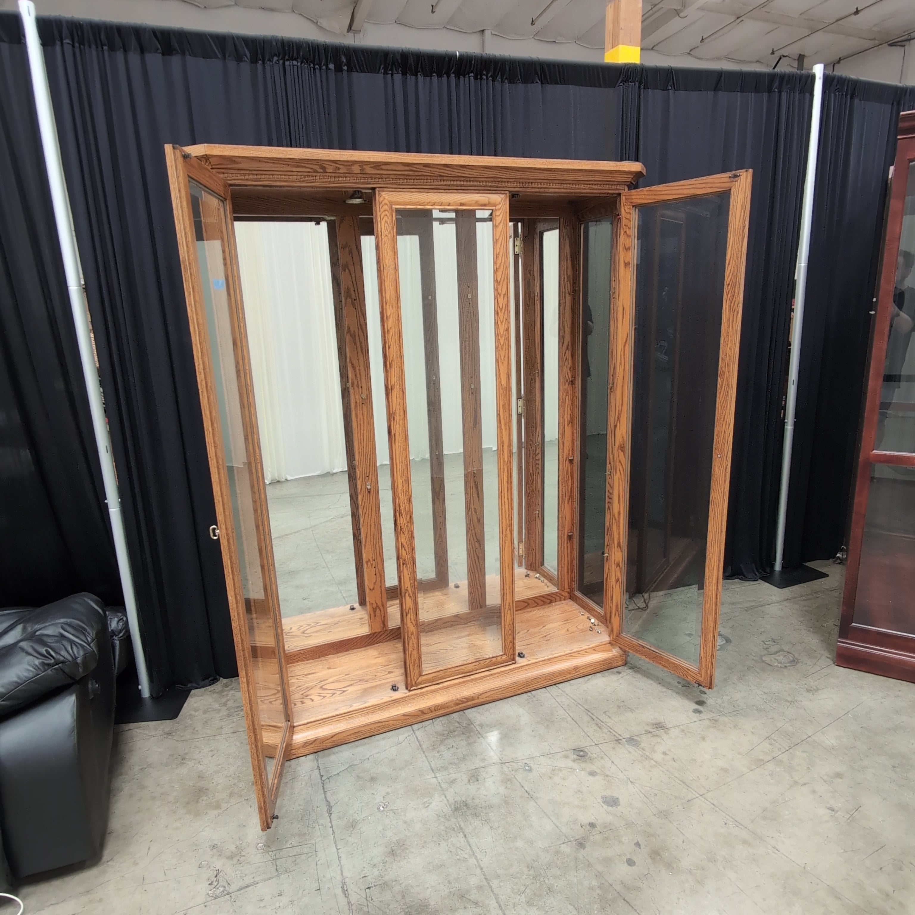Oak Finish Three-Door China Cabinet with Crown Molding