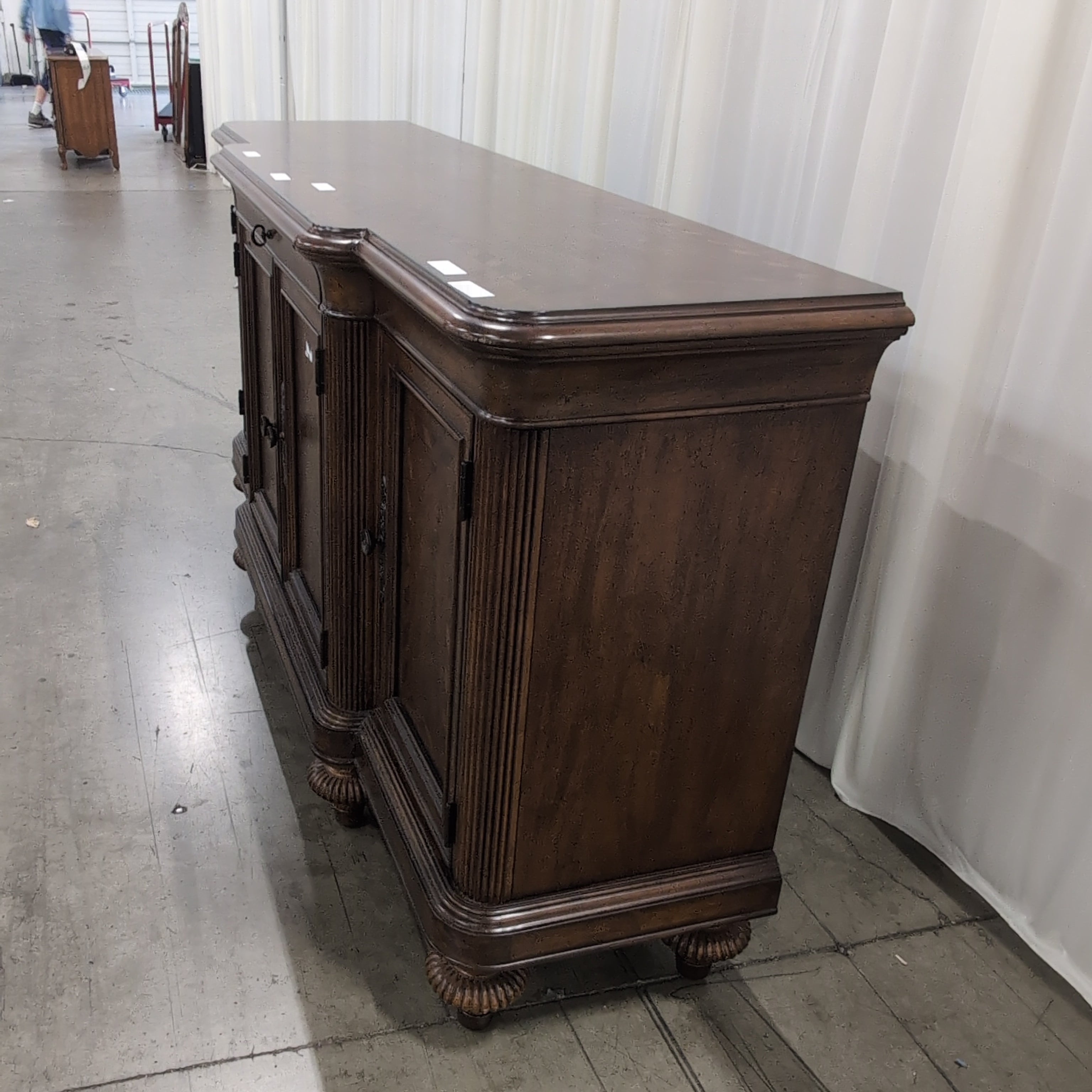 Traditional Dark Wood Buffet with Carved Details