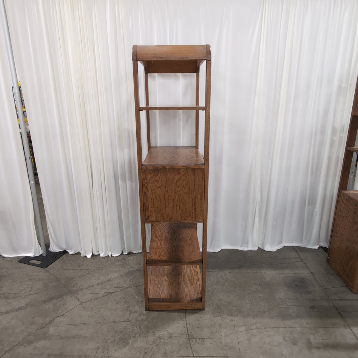 Medium Brown Wood Bookcase with Geometric Cabinet Door