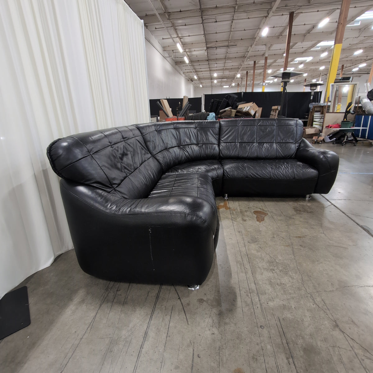 Black Tufted Leather Sectional Couch with Chrome Feet