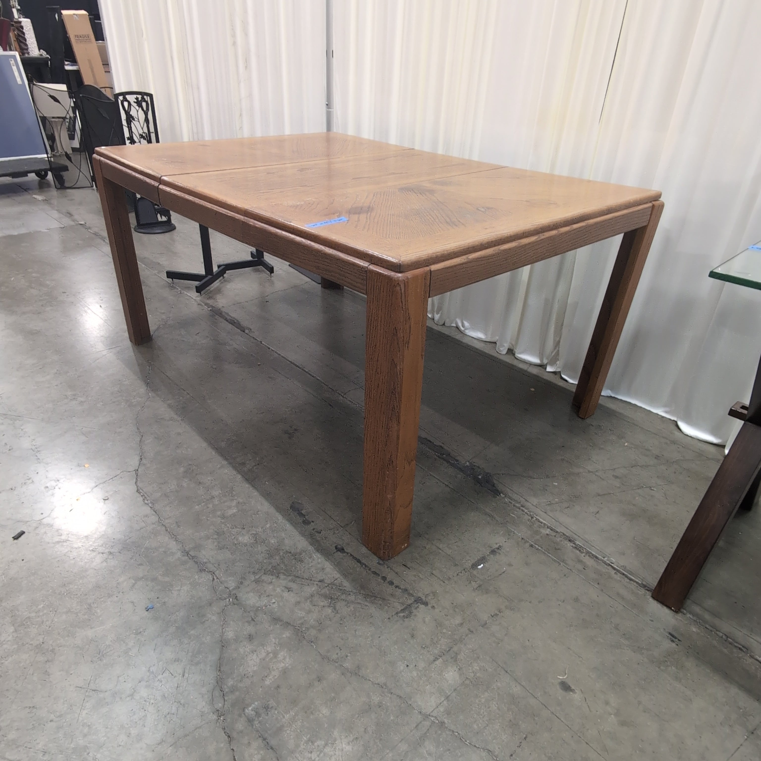 Light Brown Wood Extendable Dining Table with Leaves