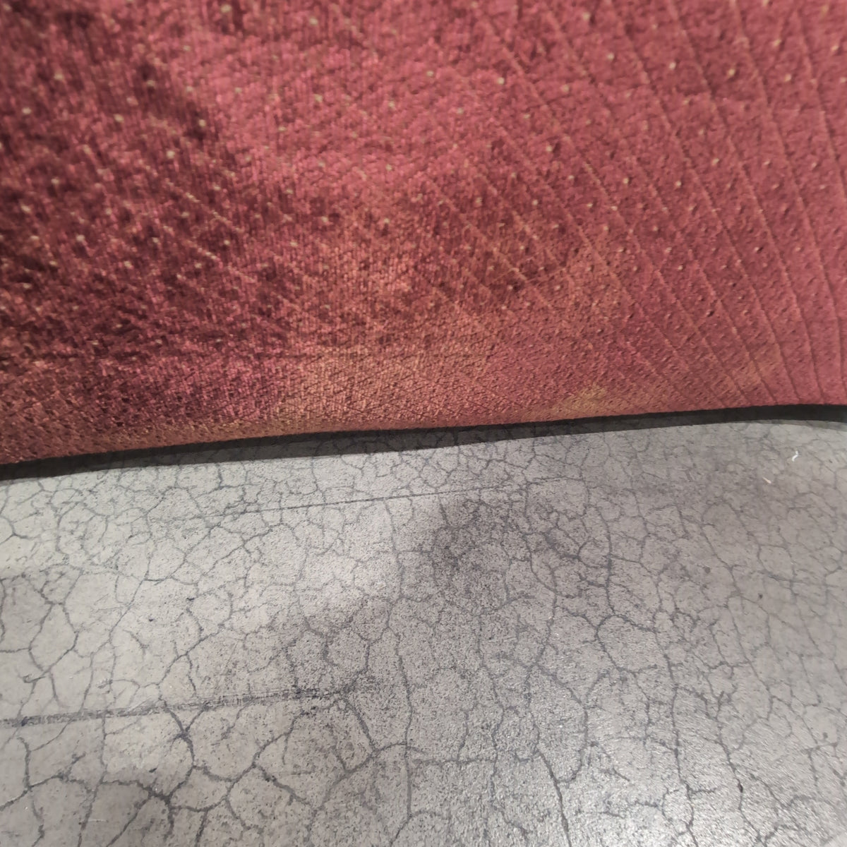 Deep Red Upholstered Three-Seat Couch