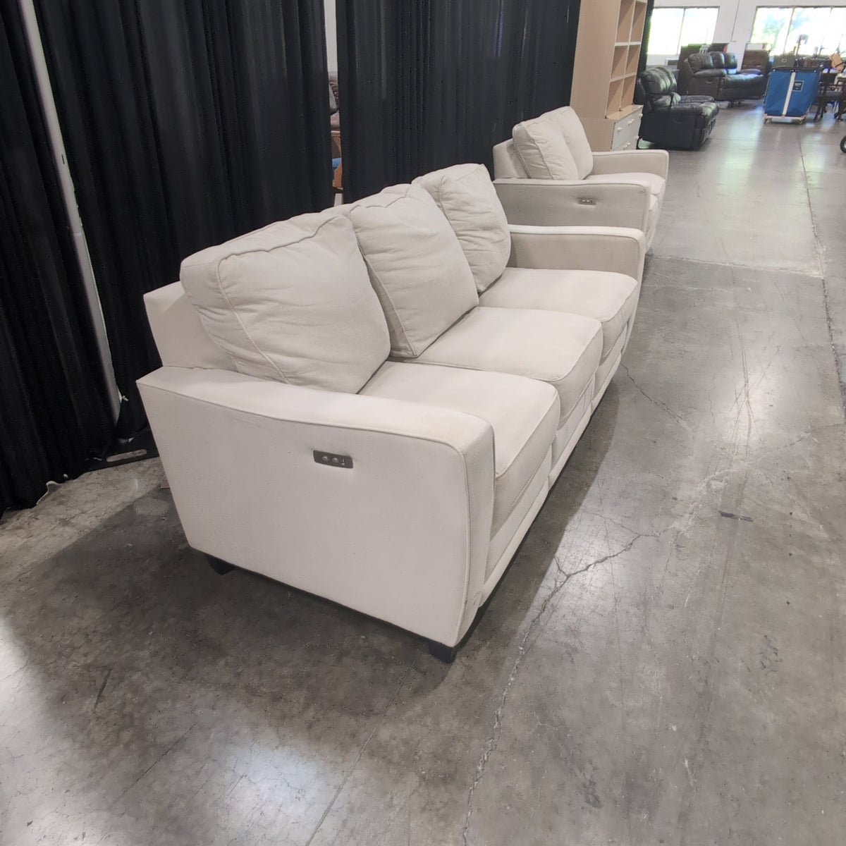 Tan Fabric Three-Seat Reclining Couch with Piped Edges