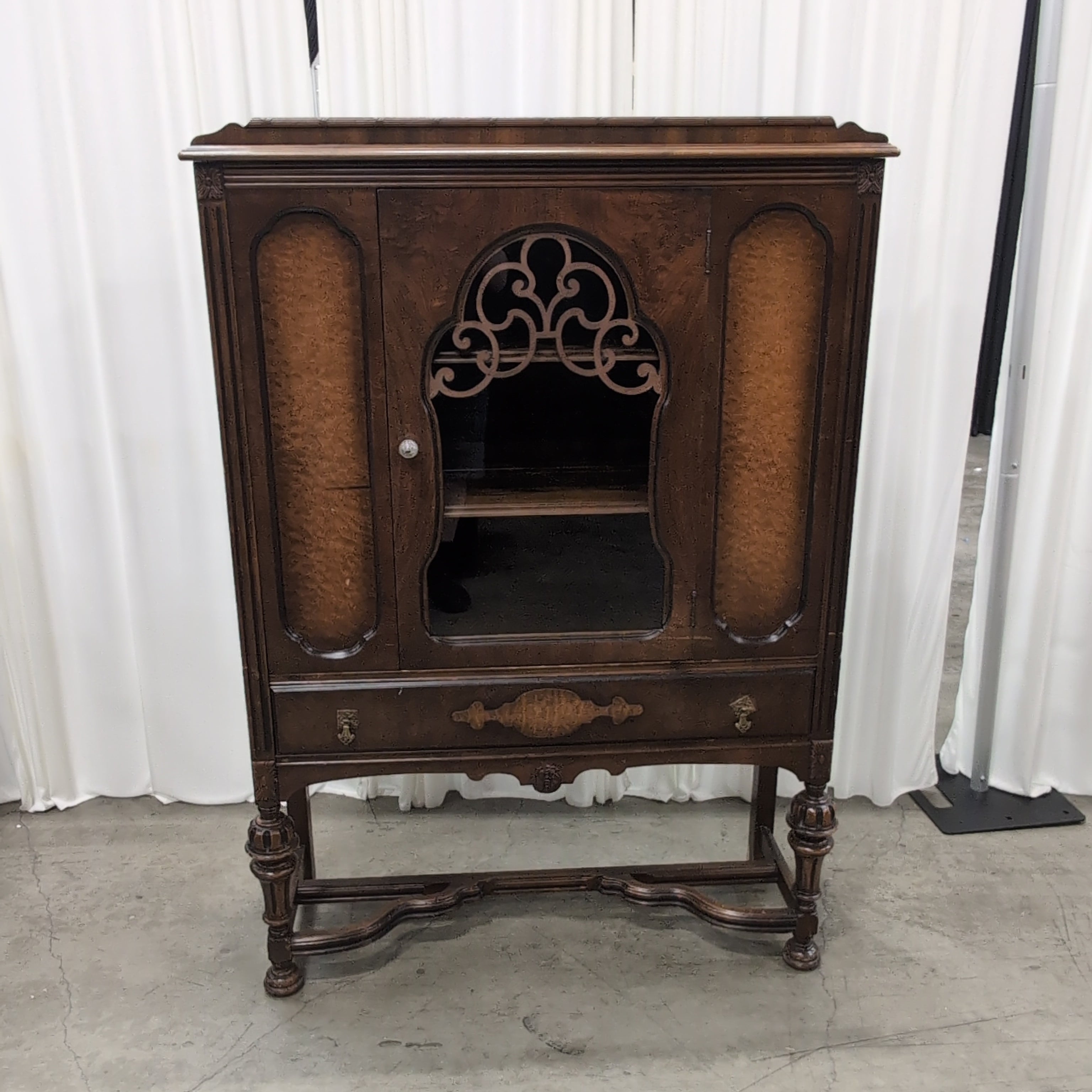 Ornate Dark Wood China Cabinet with Scrollwork