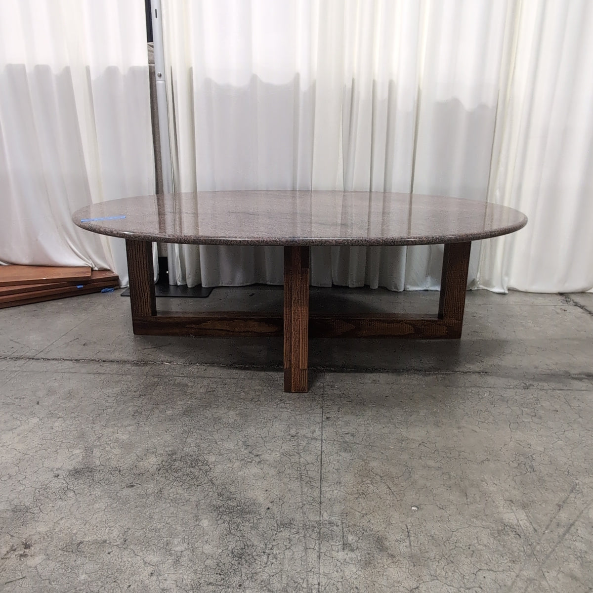 Round Light Granite Dining Table with Scrolled Iron Base