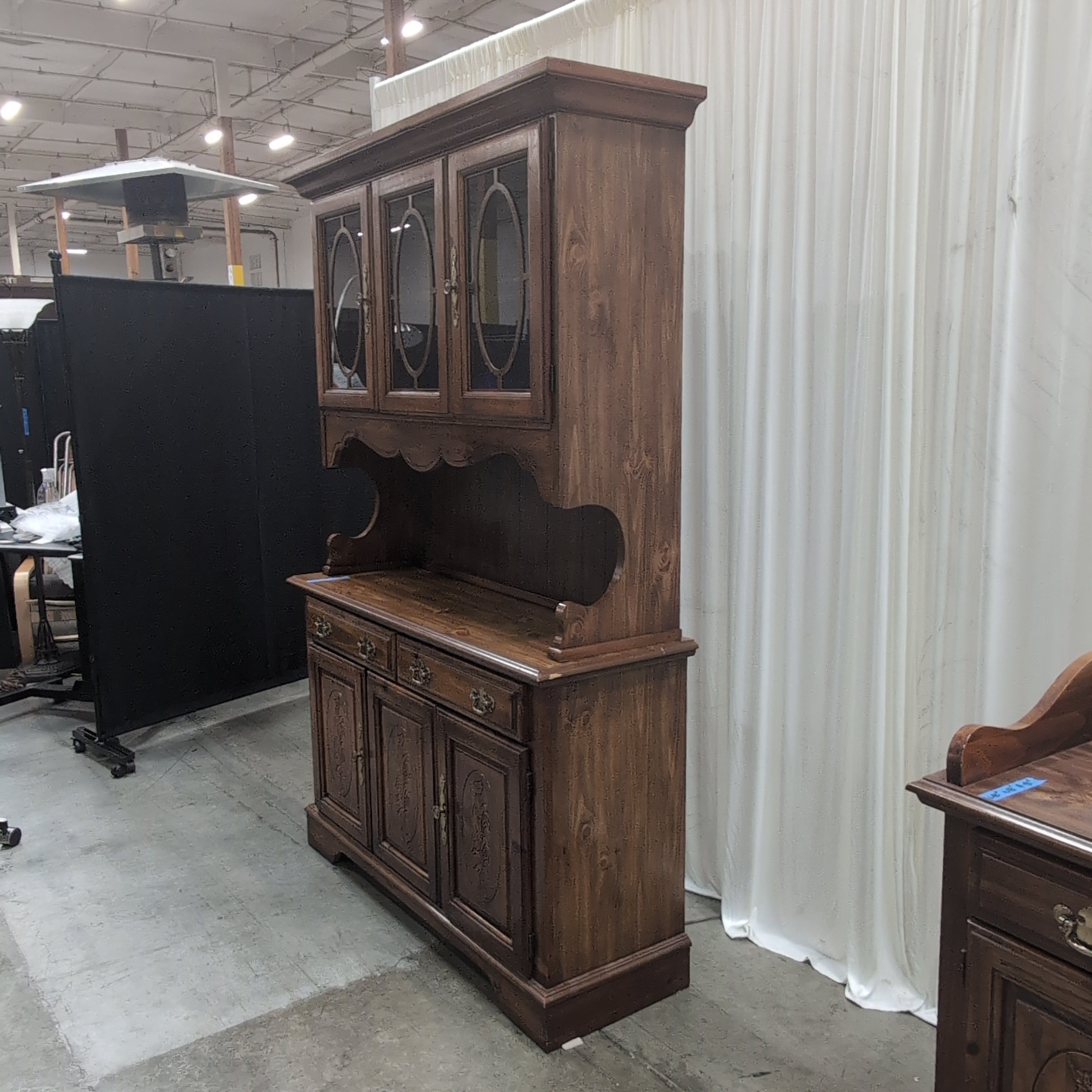Traditional Dark Wood China Cabinet with Ornate Carvings