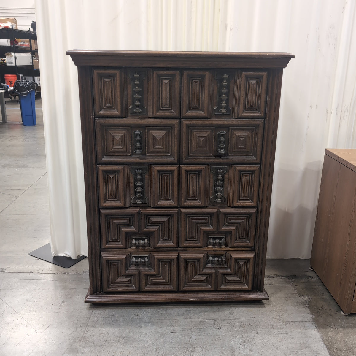 Dark Wood Carved Geometric Dresser with Ornate Hardware