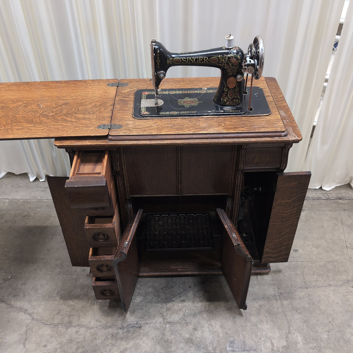 Vintage SINGER Sewing Machine with Dark Wood Cabinet