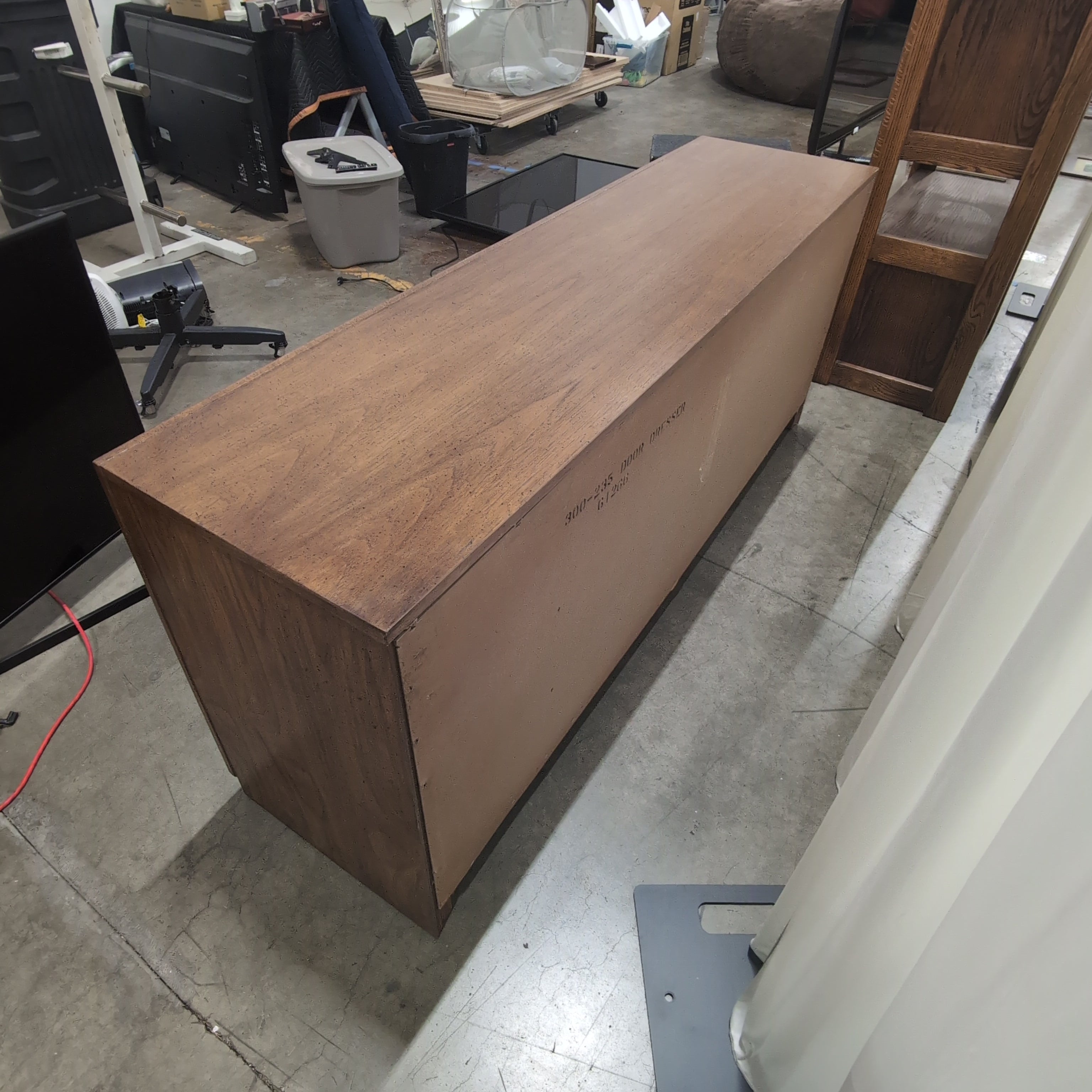 Long Brown Wood Dresser with Geometric Paneling