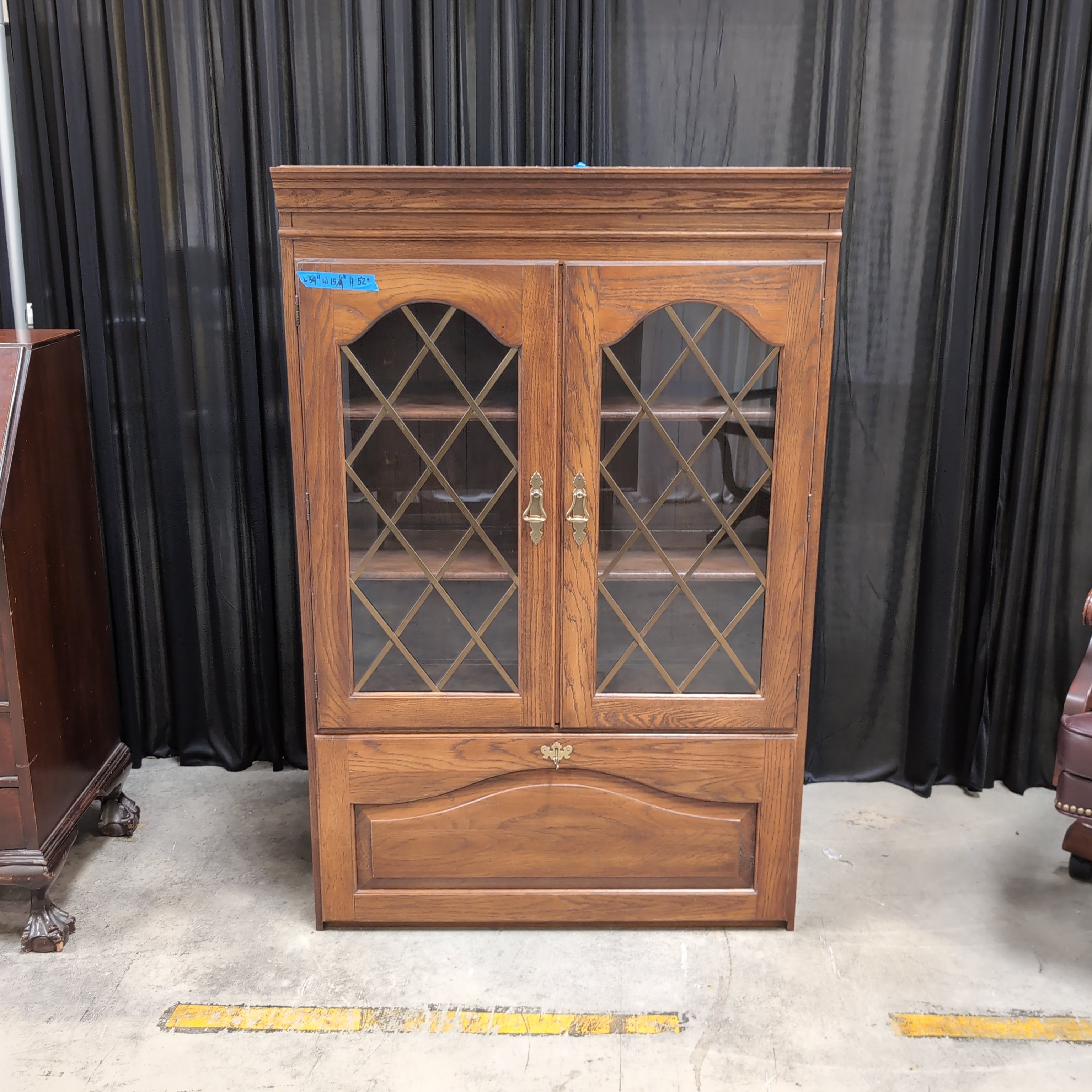 Traditional Brown Wood China Cabinet with Diamond Mullions