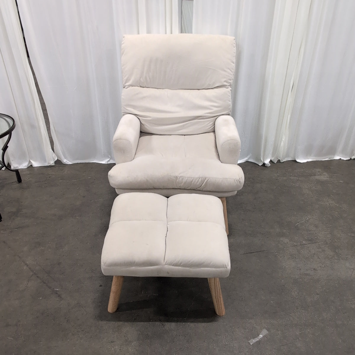 Cream Upholstered Four-Cushion Ottoman with Tapered Legs