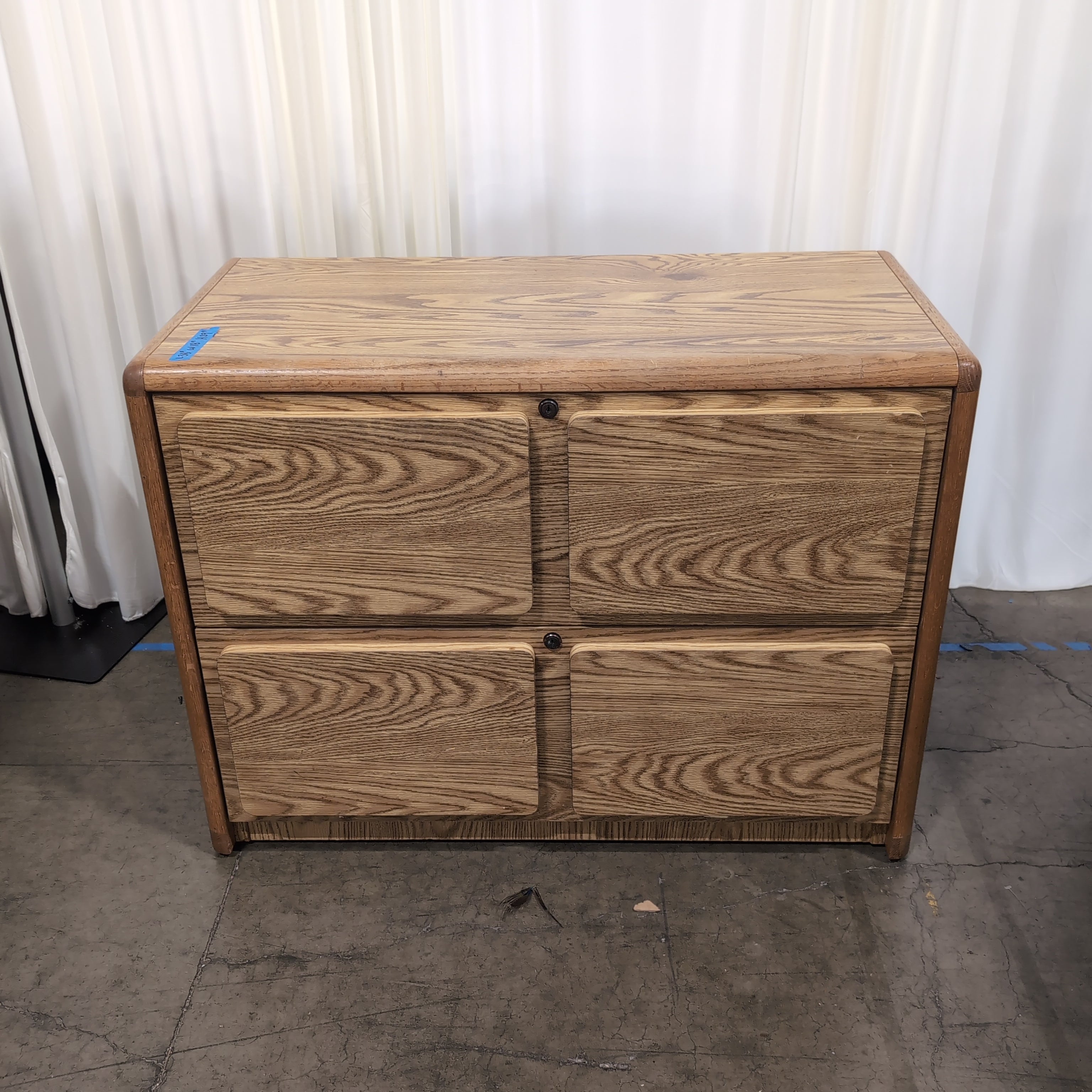 Light Oak Wood Four-Drawer Filing Cabinet