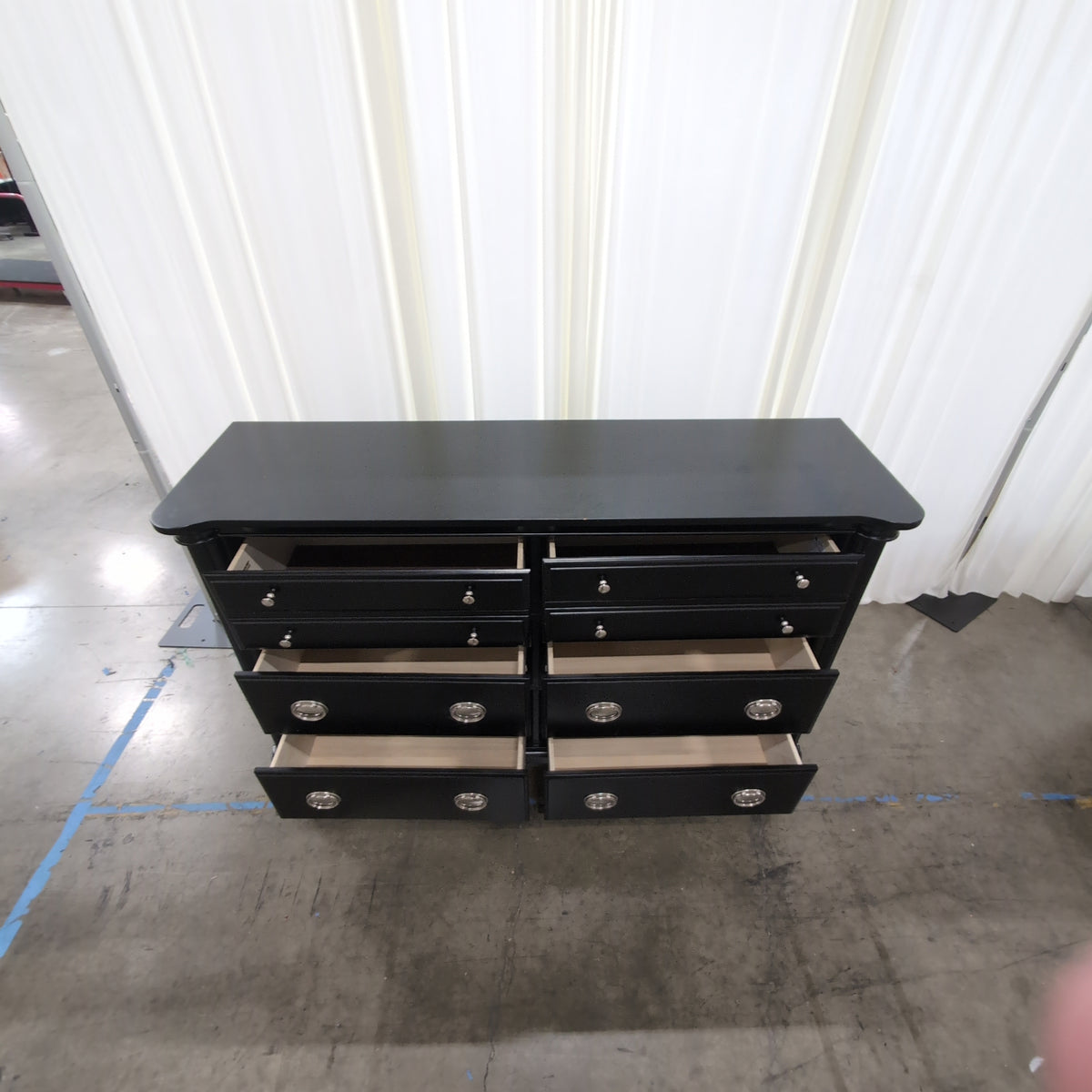 Black Eight-Drawer Traditional Dresser with Silver Hardware