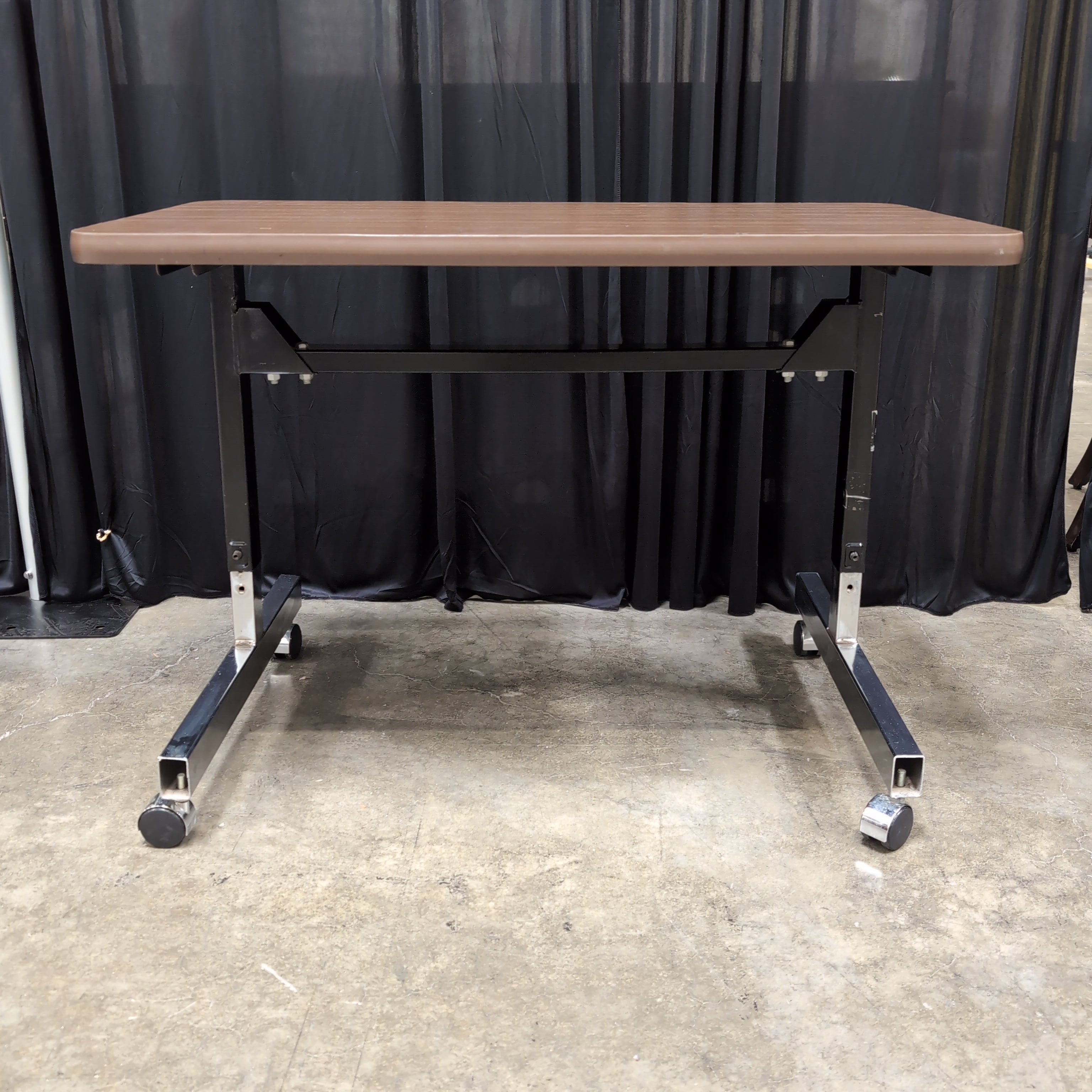 Brown Laminate Rectangular Utility Table with Casters