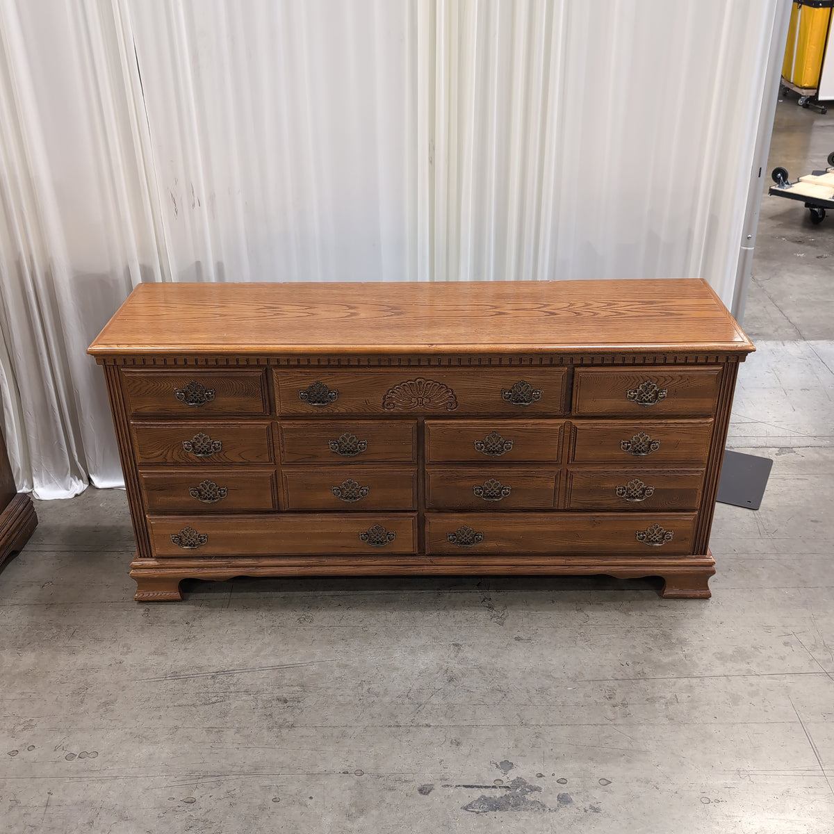 Traditional Brown Wood Dresser with Ornate Hardware