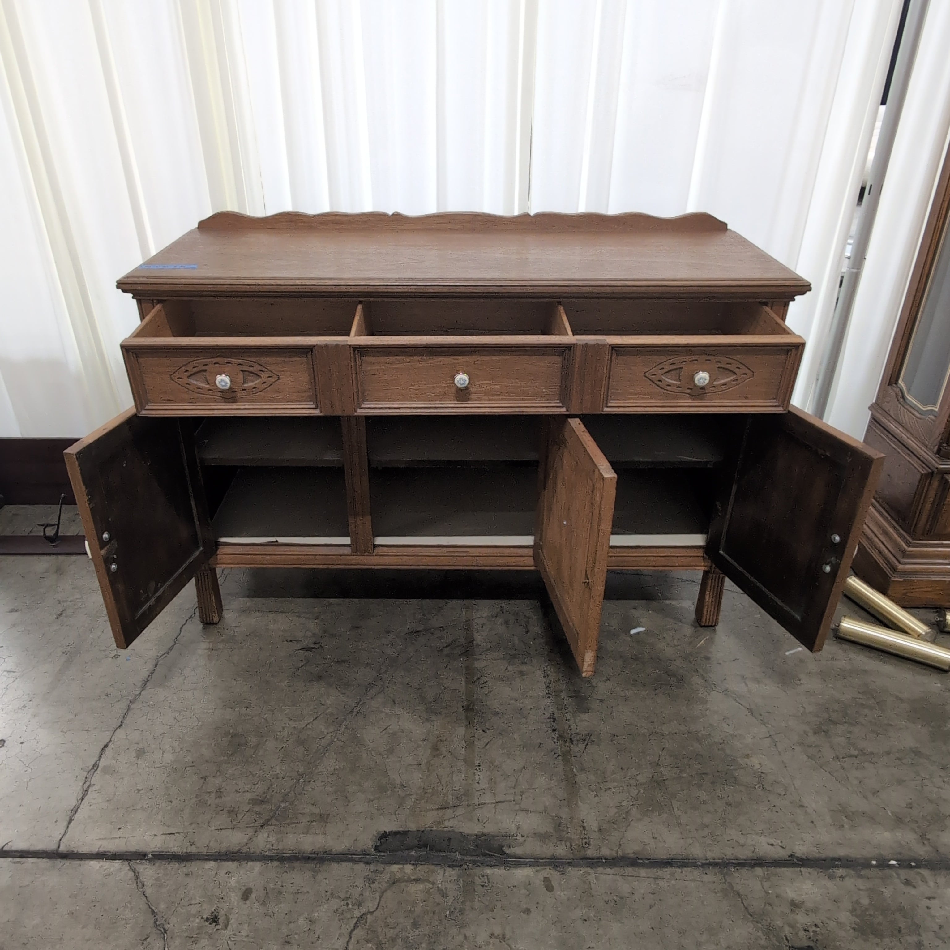 Ornate Light Wood Buffet with Decorative Pulls