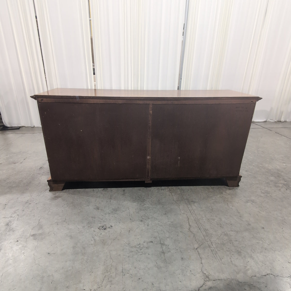 Traditional Brown Wood Dresser with Ornate Hardware