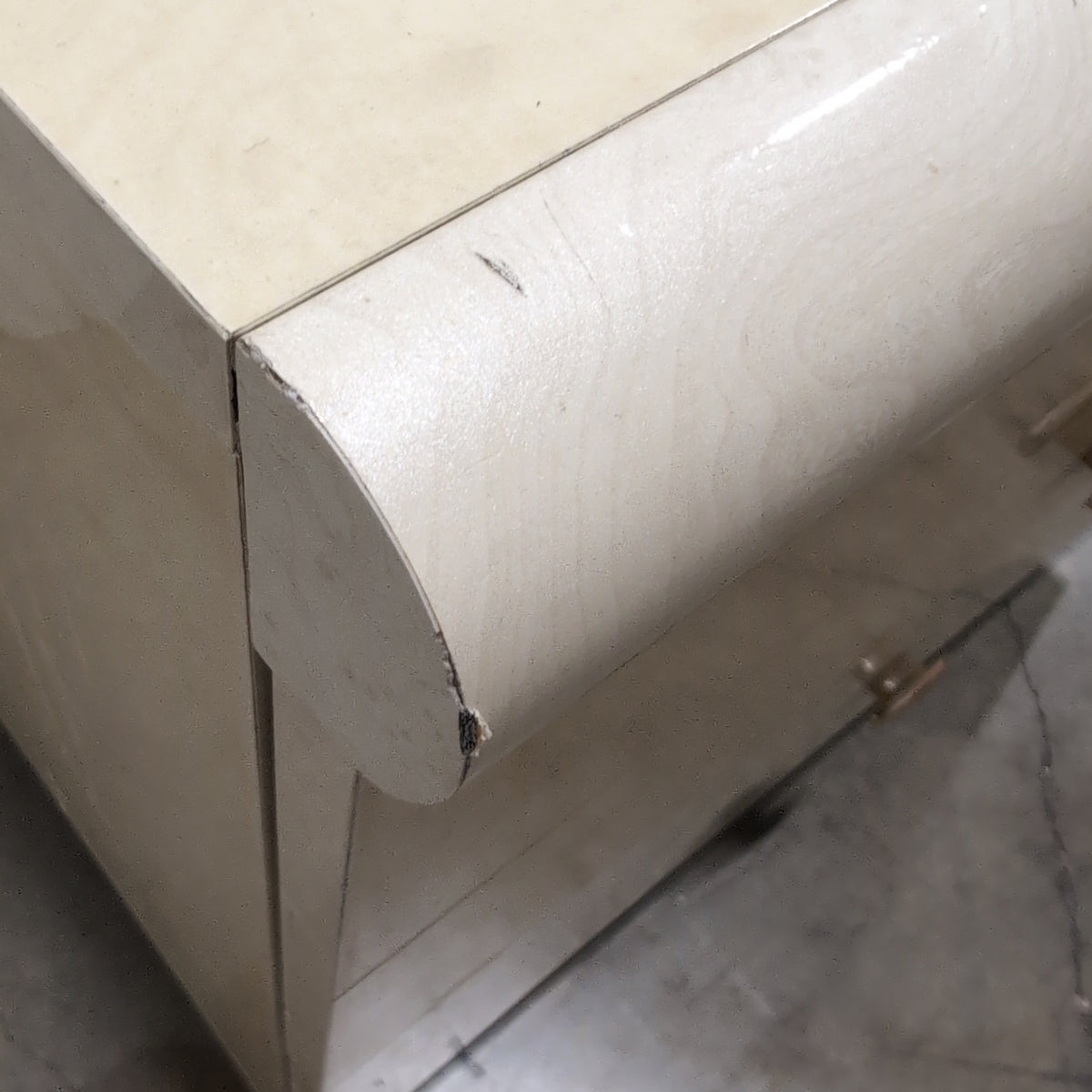 Light Burlwood Pattern Three-Drawer Nightstand with Gold Pulls