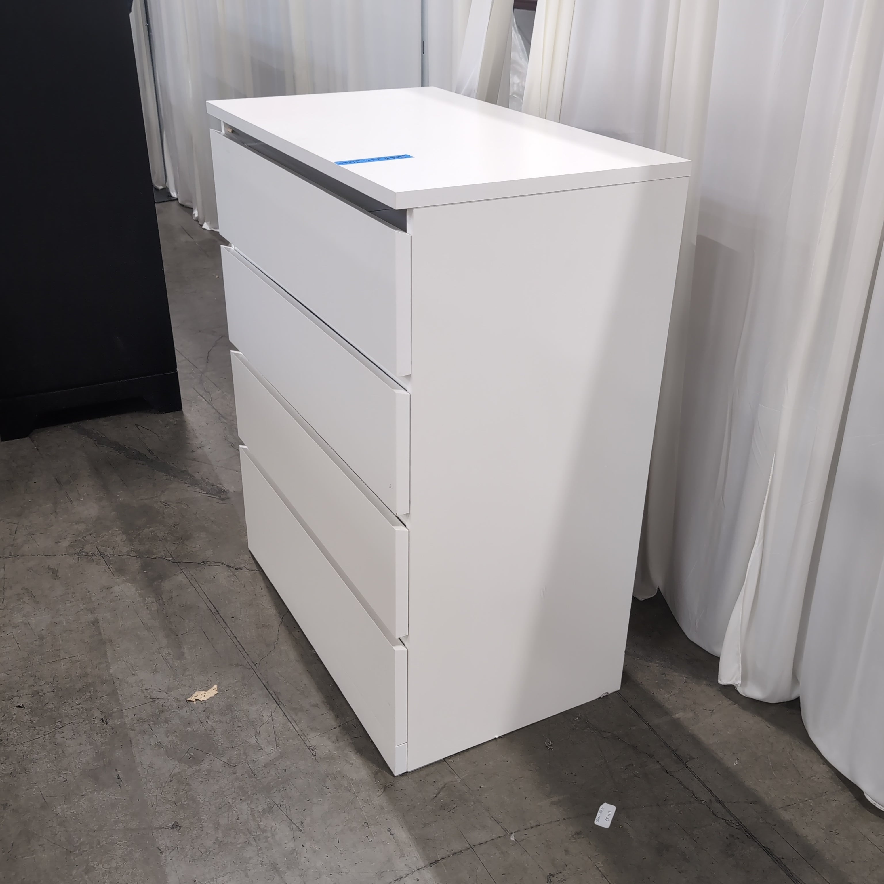 White Laminate Four-Drawer Dresser