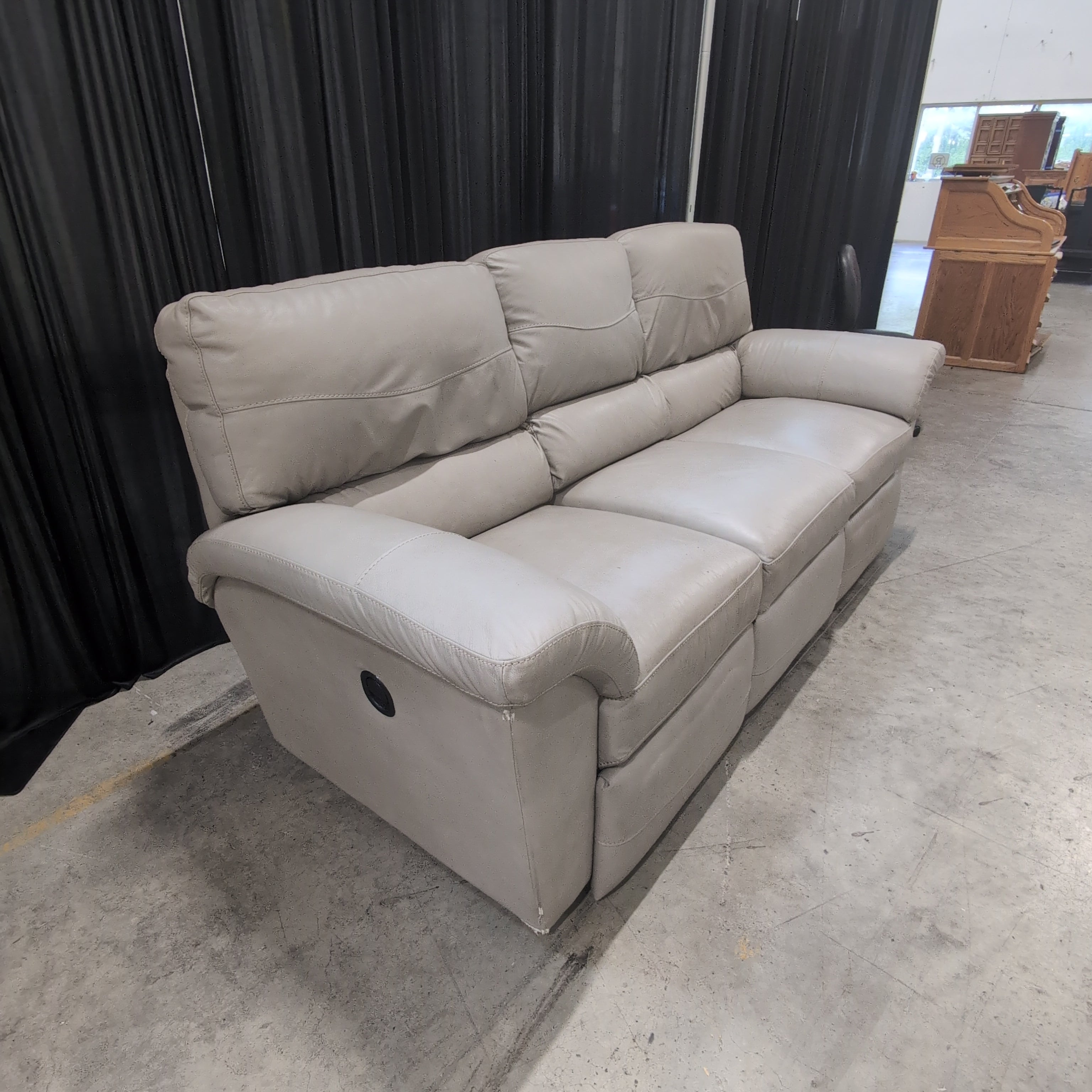 Padded Beige Reclining Three-Seat Couch in Faux Leather