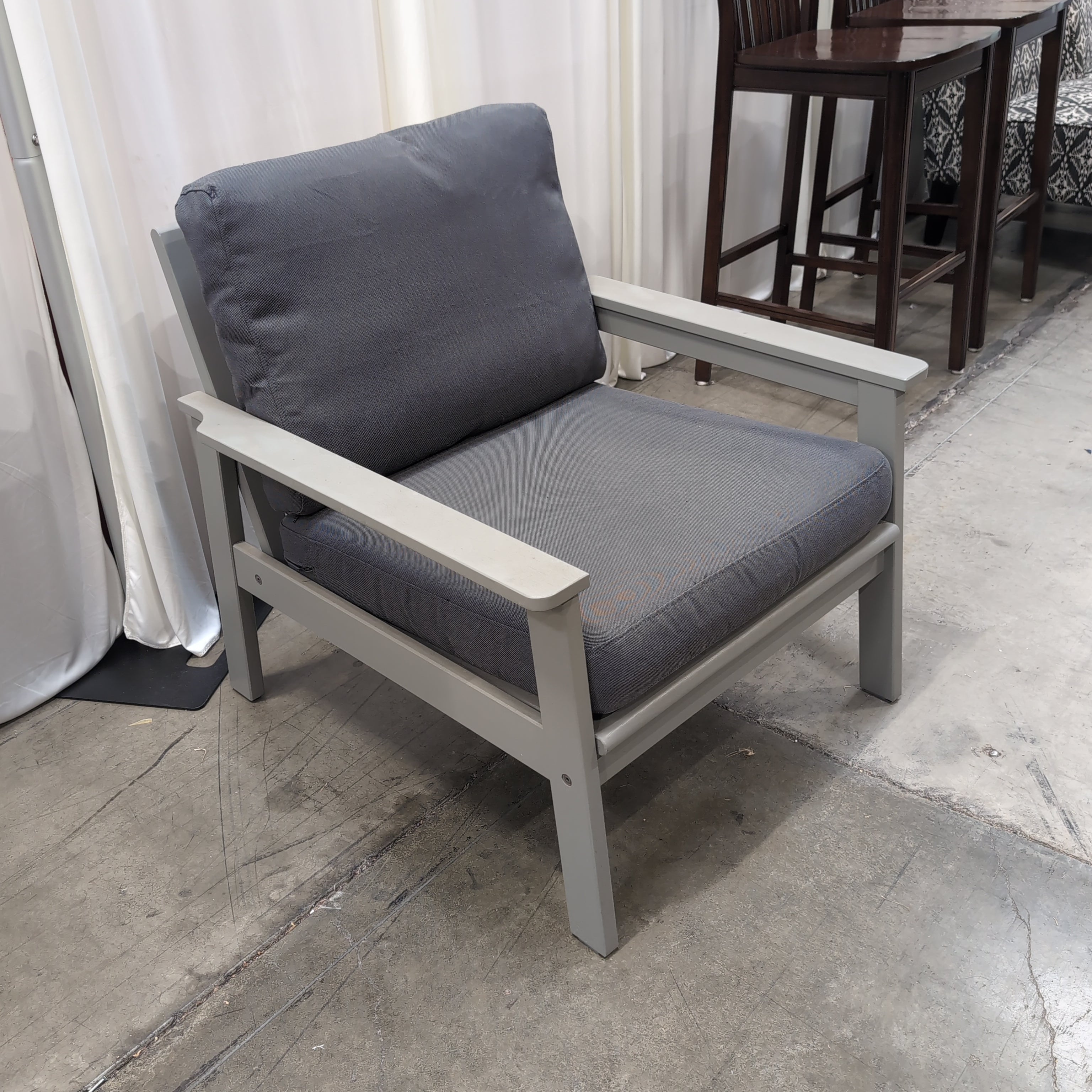 Modern Light Wood Armchair with Grey Cushions