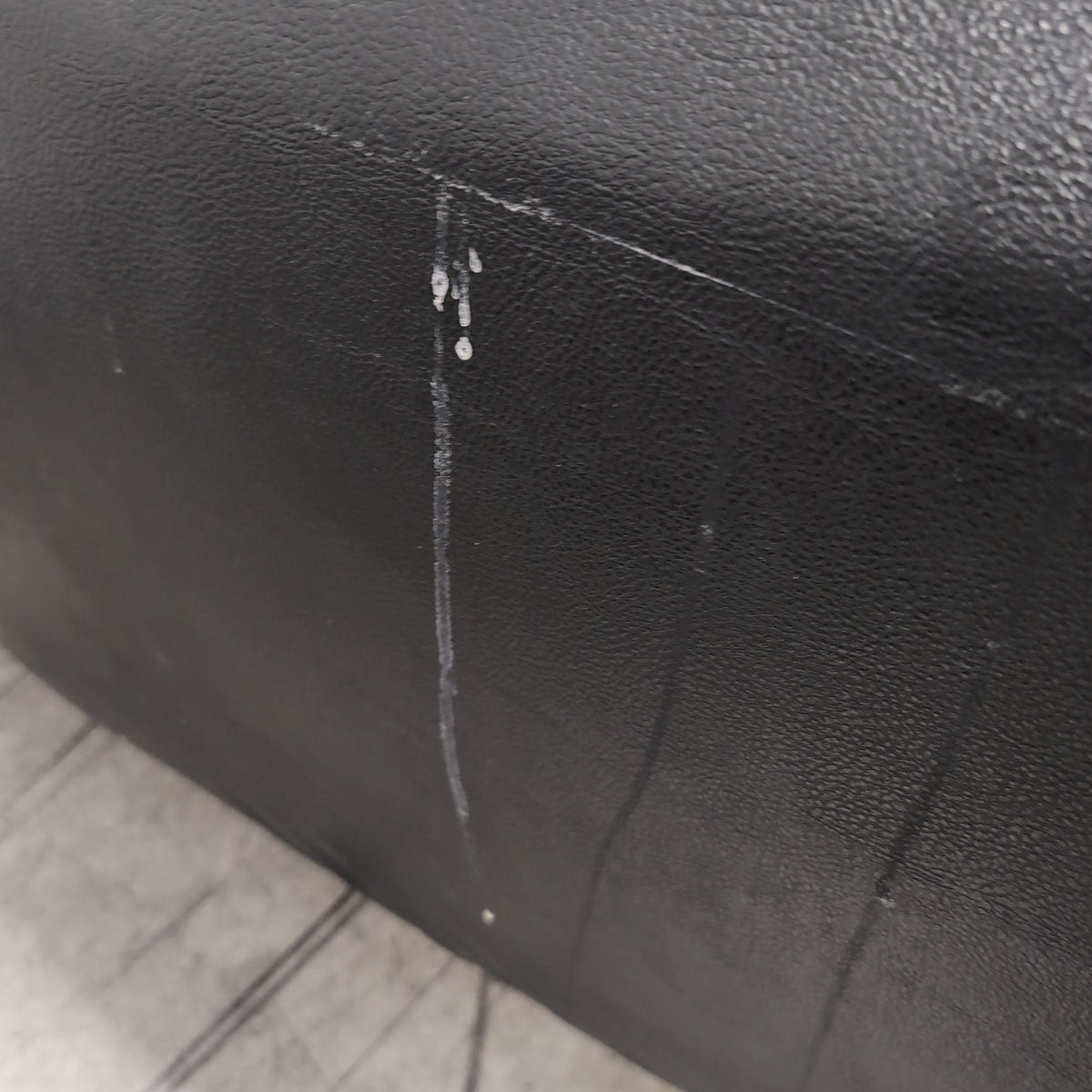 Black Tufted Leather Sectional Couch with Chrome Feet