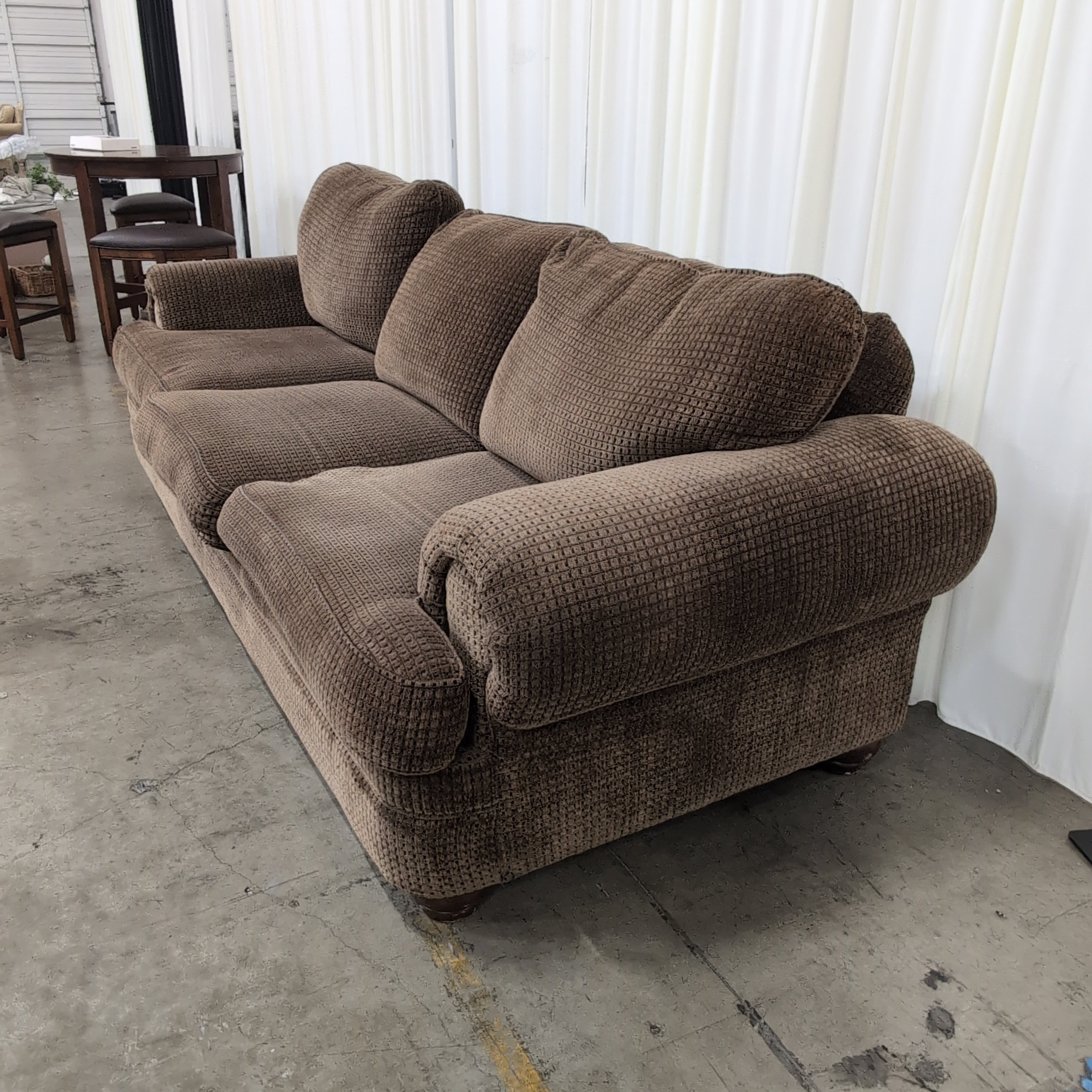 Brown Rolled Arm Three-Cushion Couch in Textured Fabric