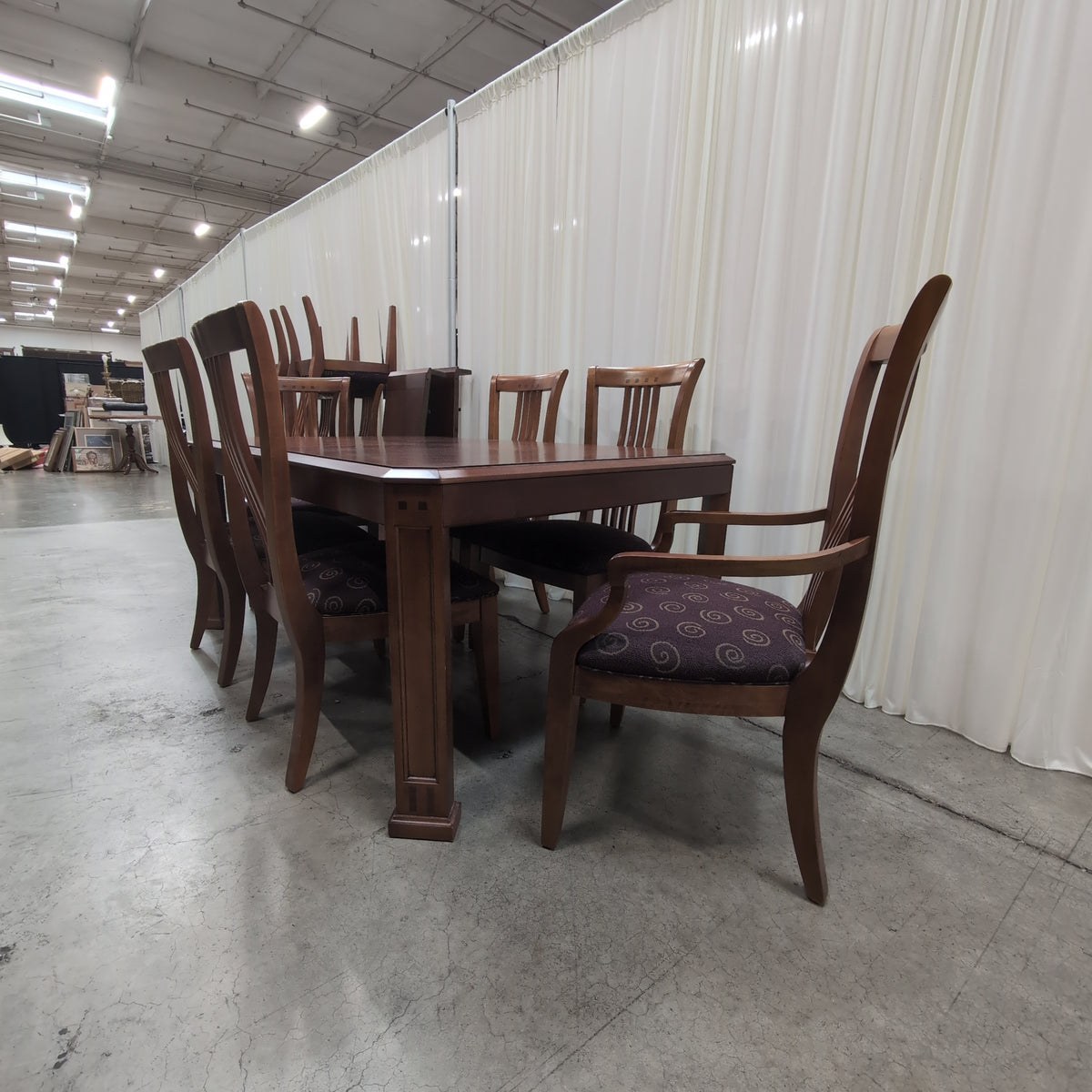 Dark Stained Wood Dining Table with Chamfered Corners