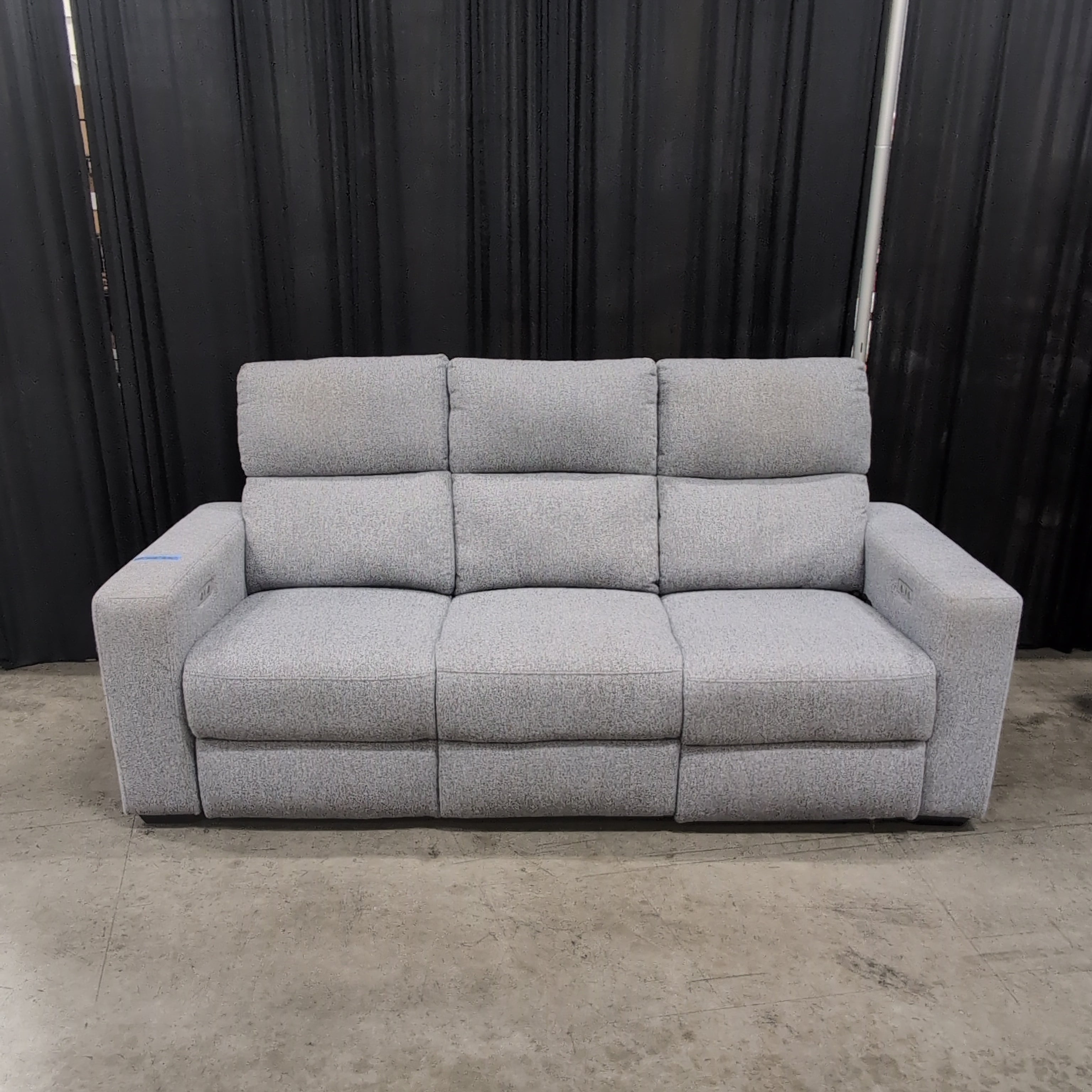 Grey Fabric Reclining Couch with Power Controls