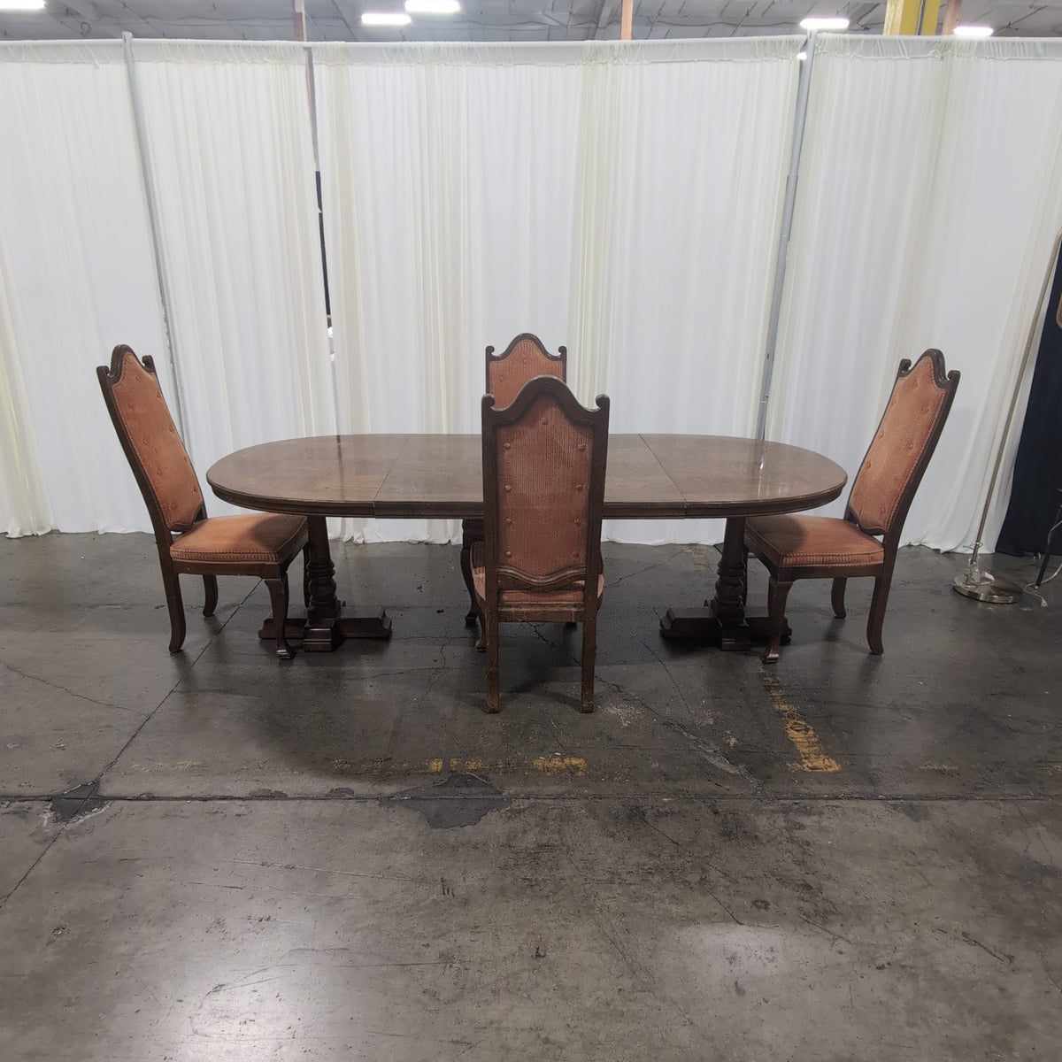Traditional Dark Wood Oval Dining Table with Four Chairs